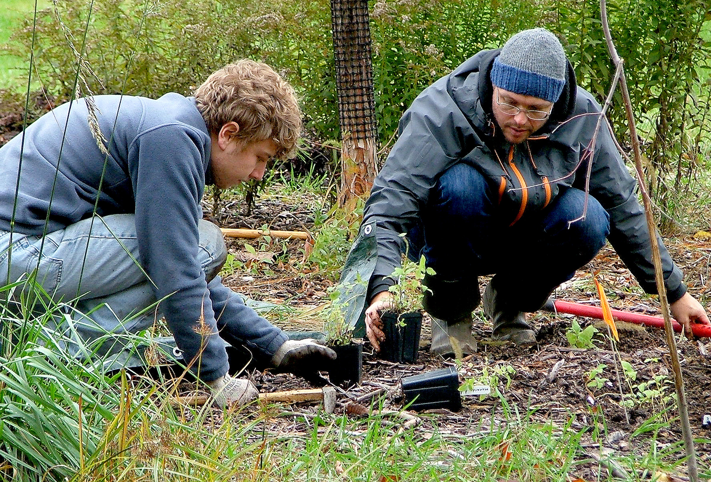 Horticulture students working on planting in the gardens.