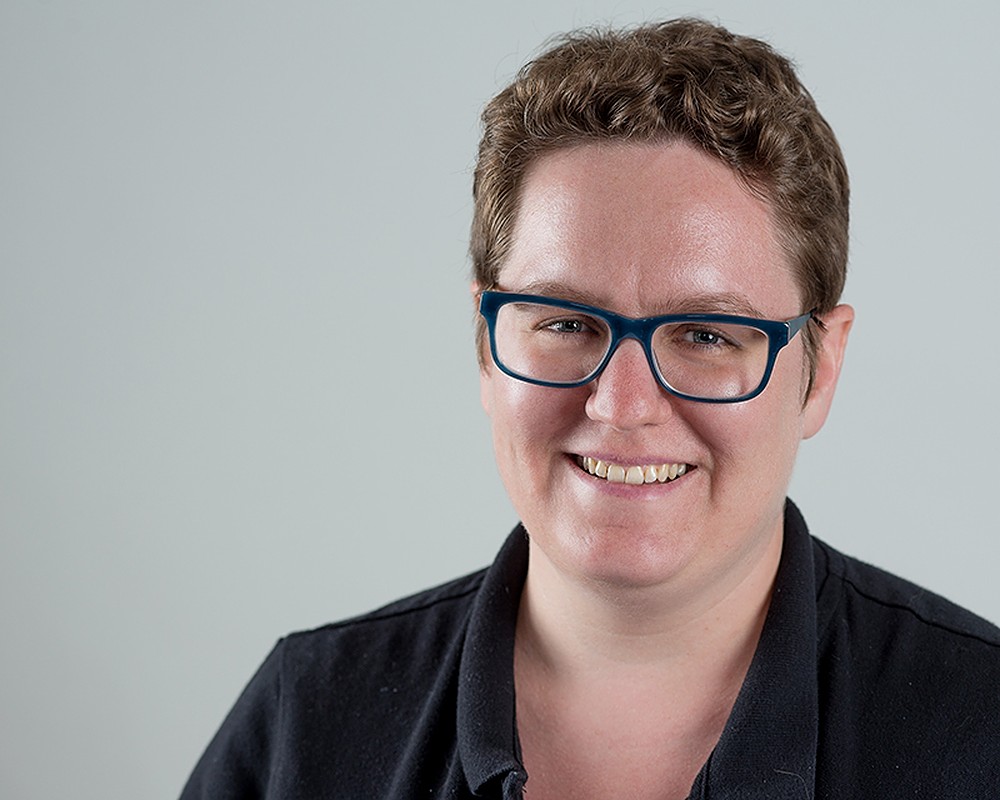 Image of Adrienne Shaw in a black shirt.