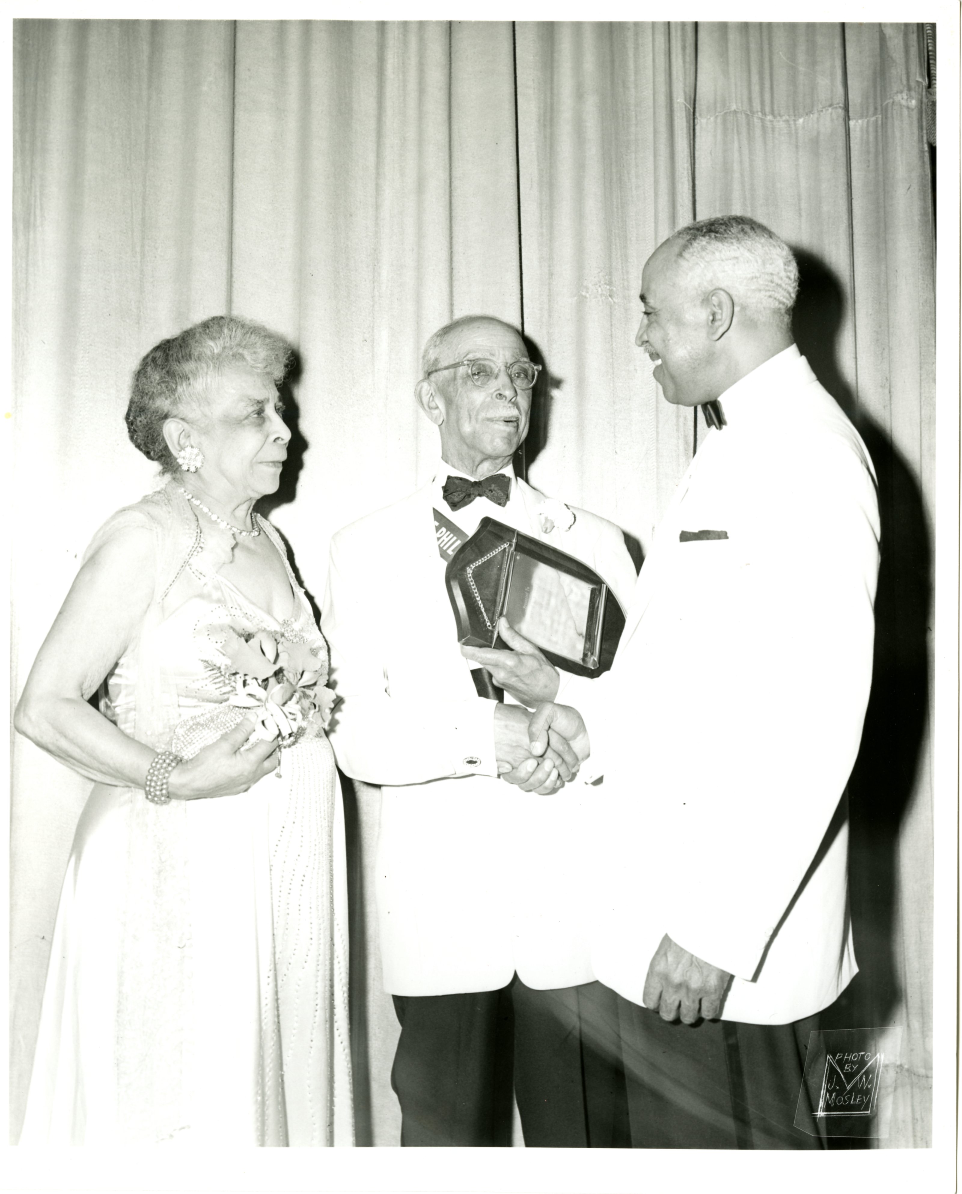 Dr. Agnes Berry Montier with her husband Joseph A. Montier and Wallace K. Newsome