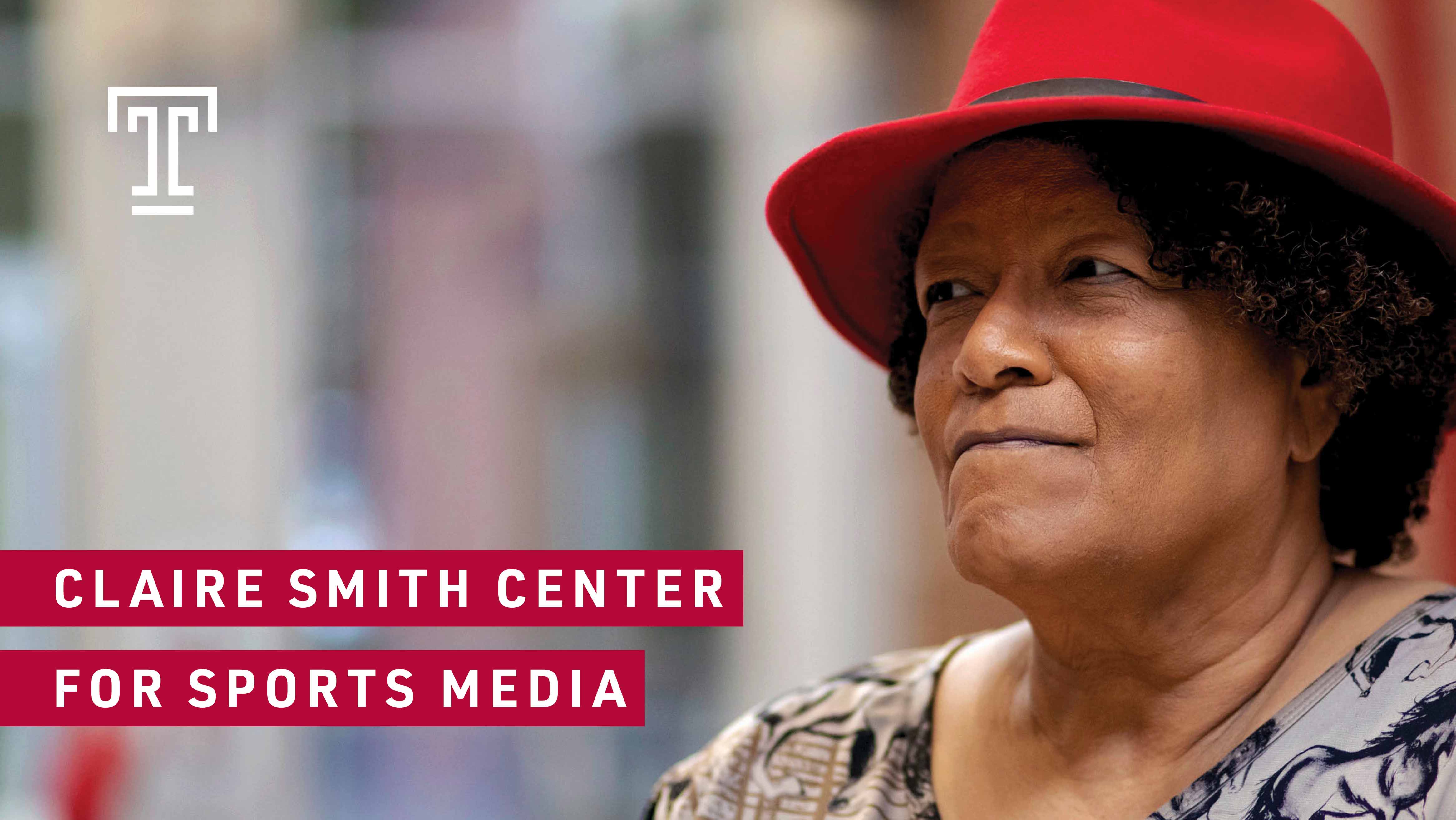 Claire Smith wearing a red hat and a black and white blouse