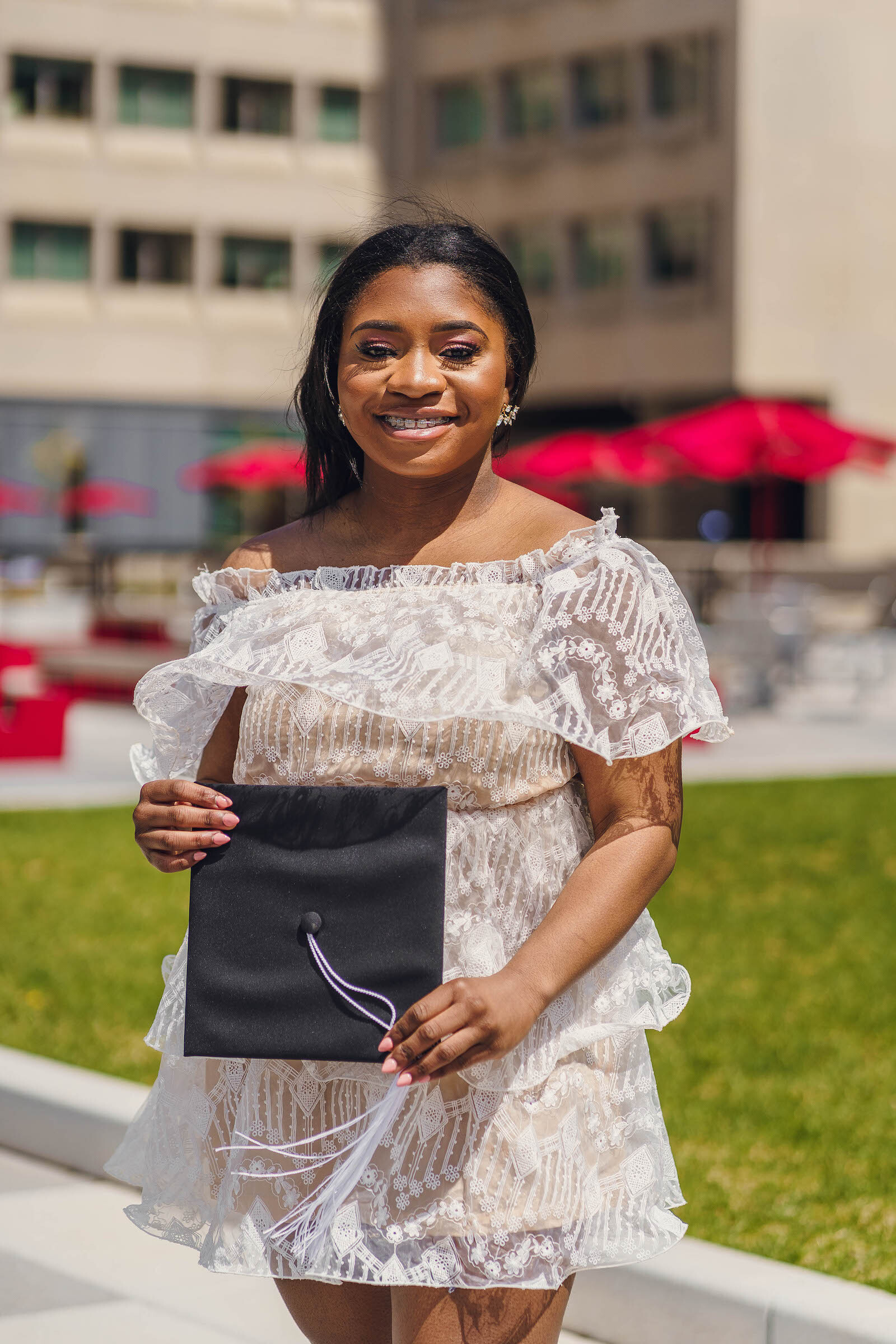 Image of Alvira Bonsu in a dress outside