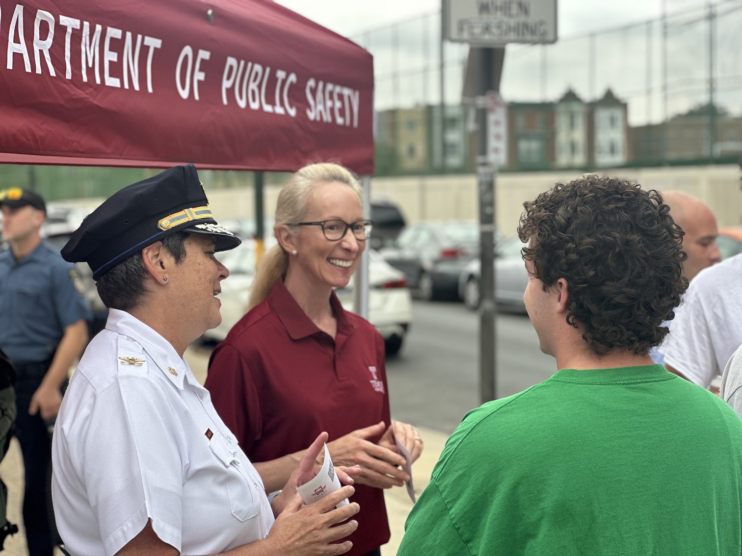 Image of Vice President of Public Safey Jennifer Griffin (center) and Executive Deputy Operations Denise Wilhelm speak with students at the Welcome Wagon on Tuesday