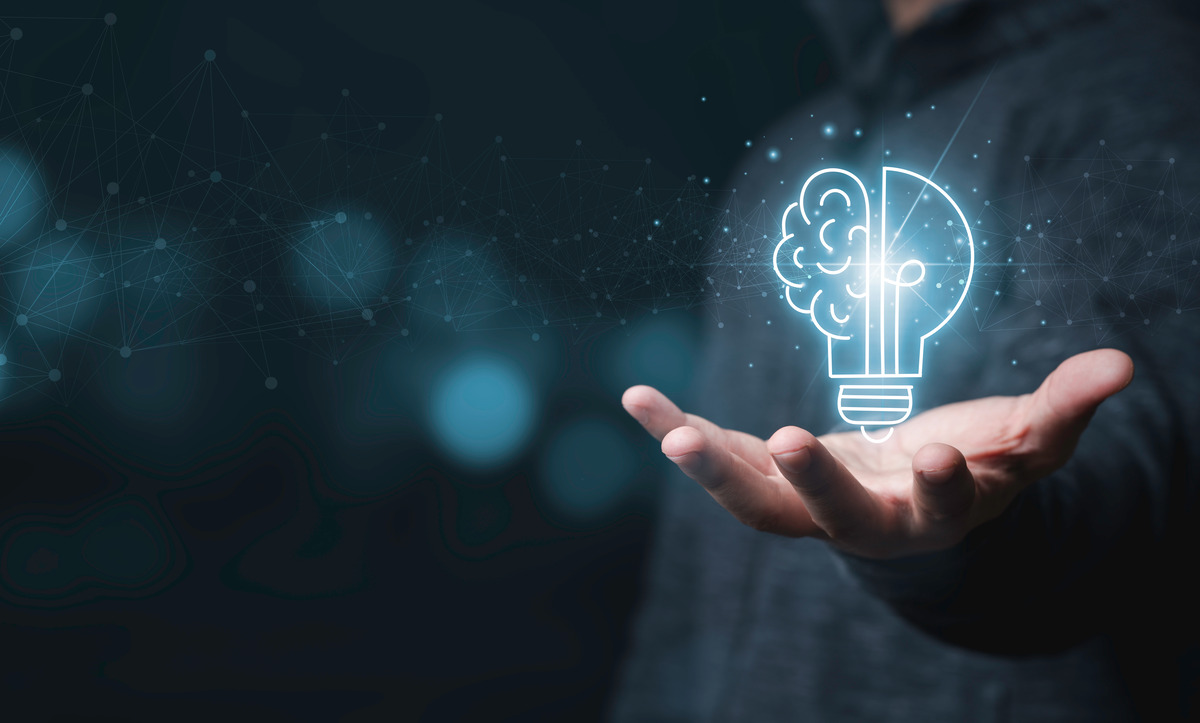lightbulb in the palm of a hand