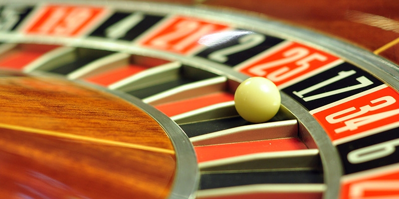 A red, white and black roulette wheel.