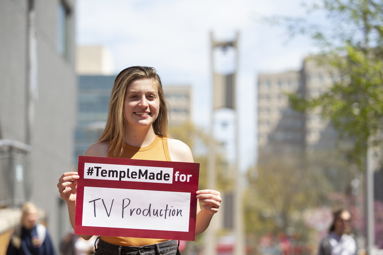 Julie Fosco standing near the Bell Tower