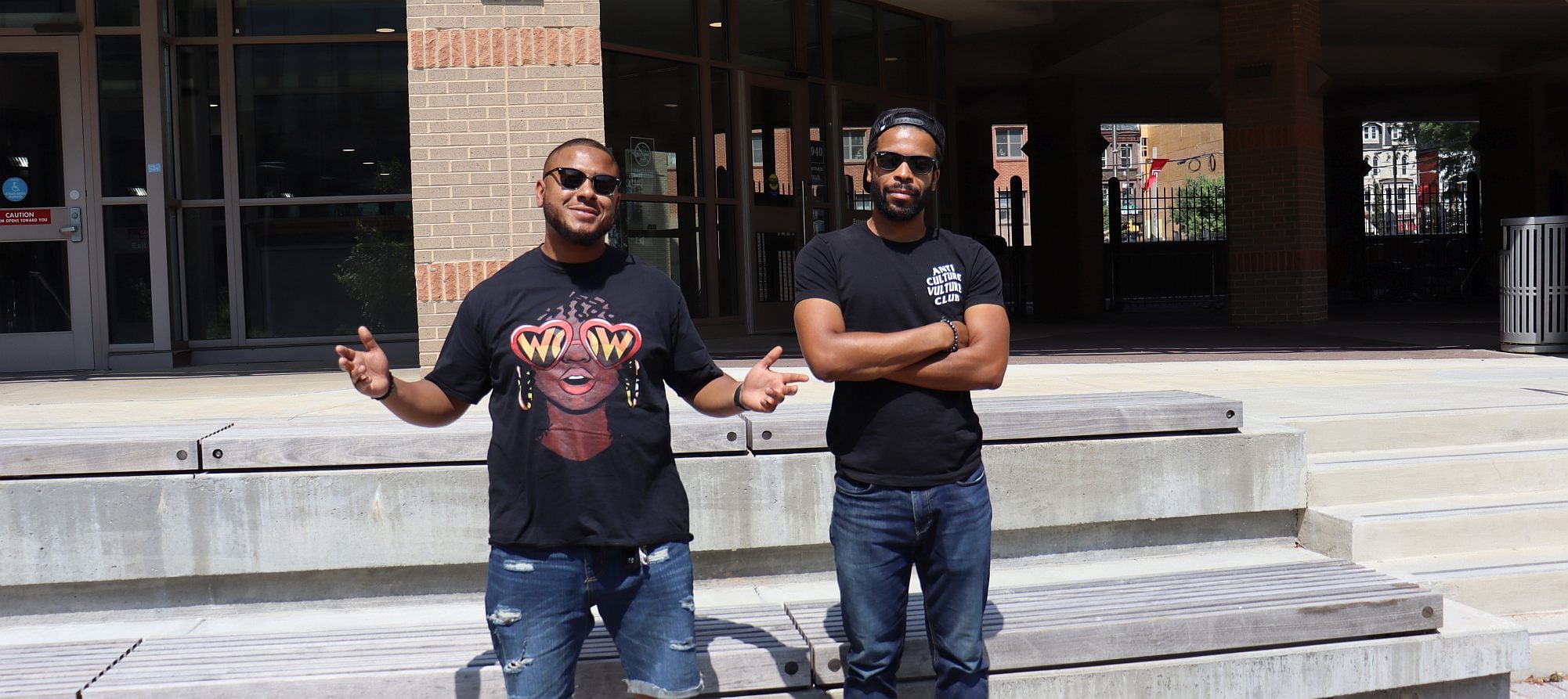 Taaj and Melvin stand outside of 1940, 13 years after they first met at the freshman dorm.