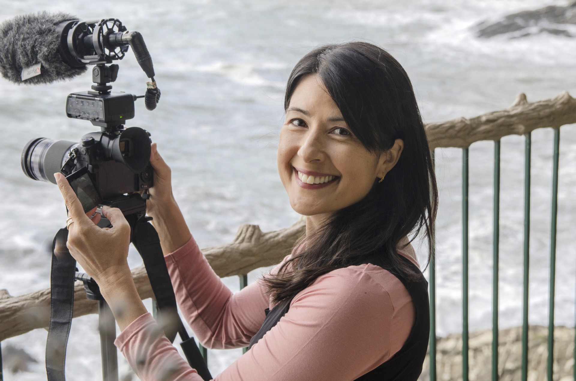 Kimi Takesue holding her camera