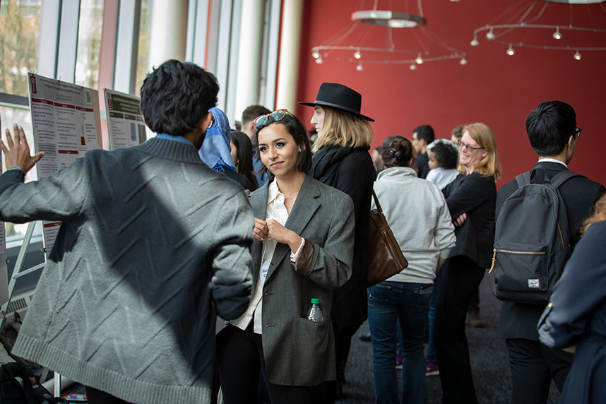 Students presenting at Symposium