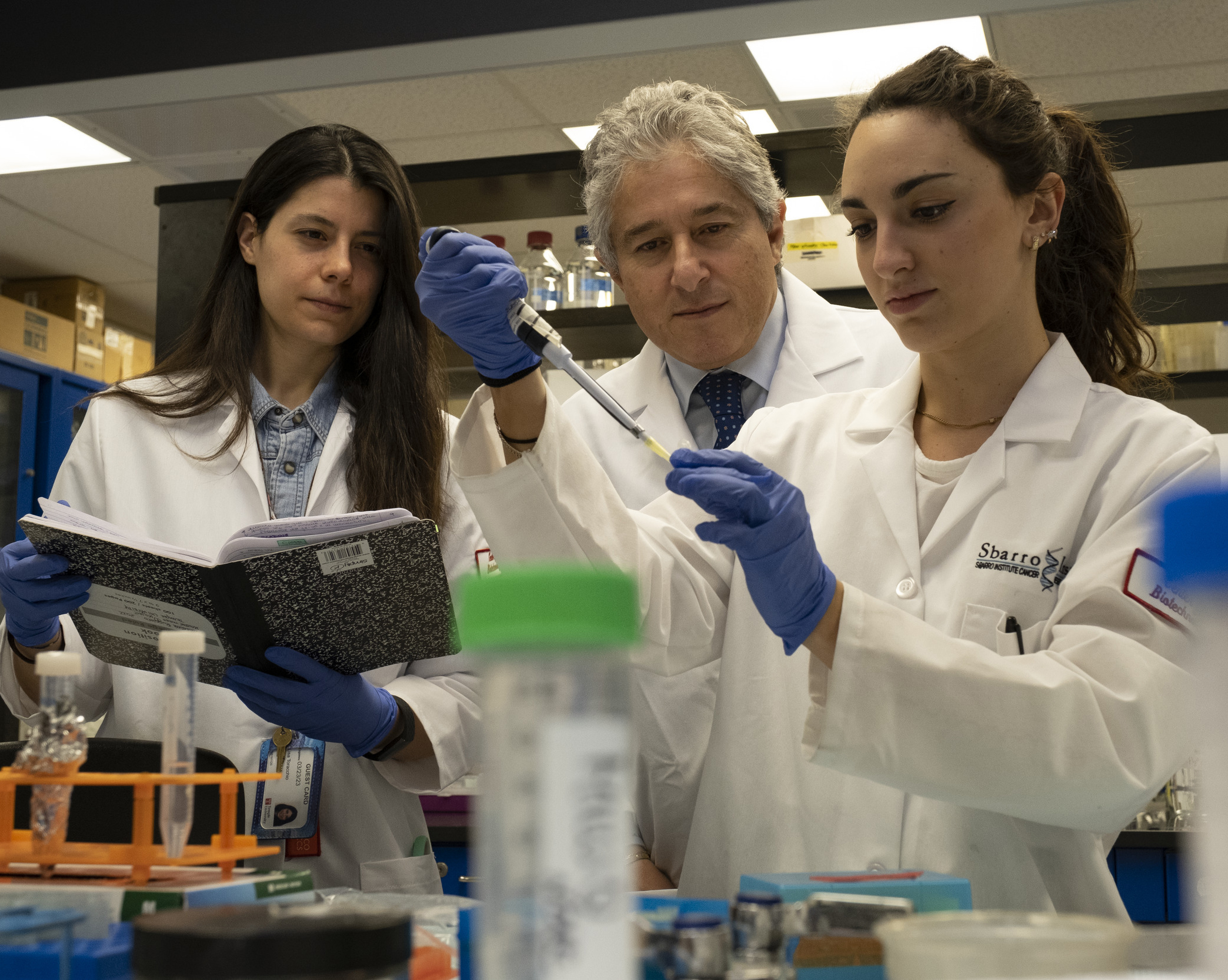 Biology researchers working in the lab
