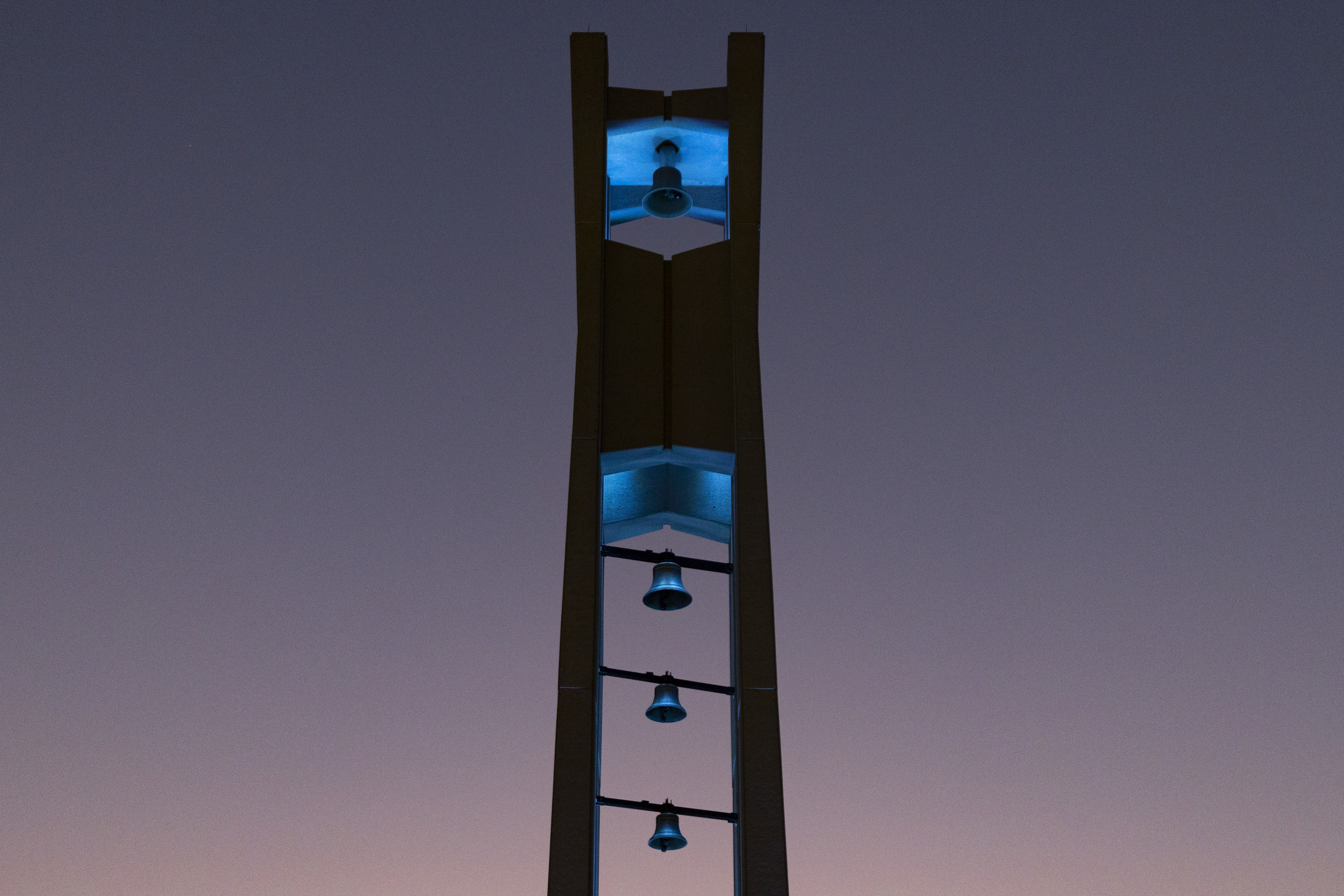 Temple's Bell Tower illuminated blue in honor of Suicide Prevention and Awareness Month