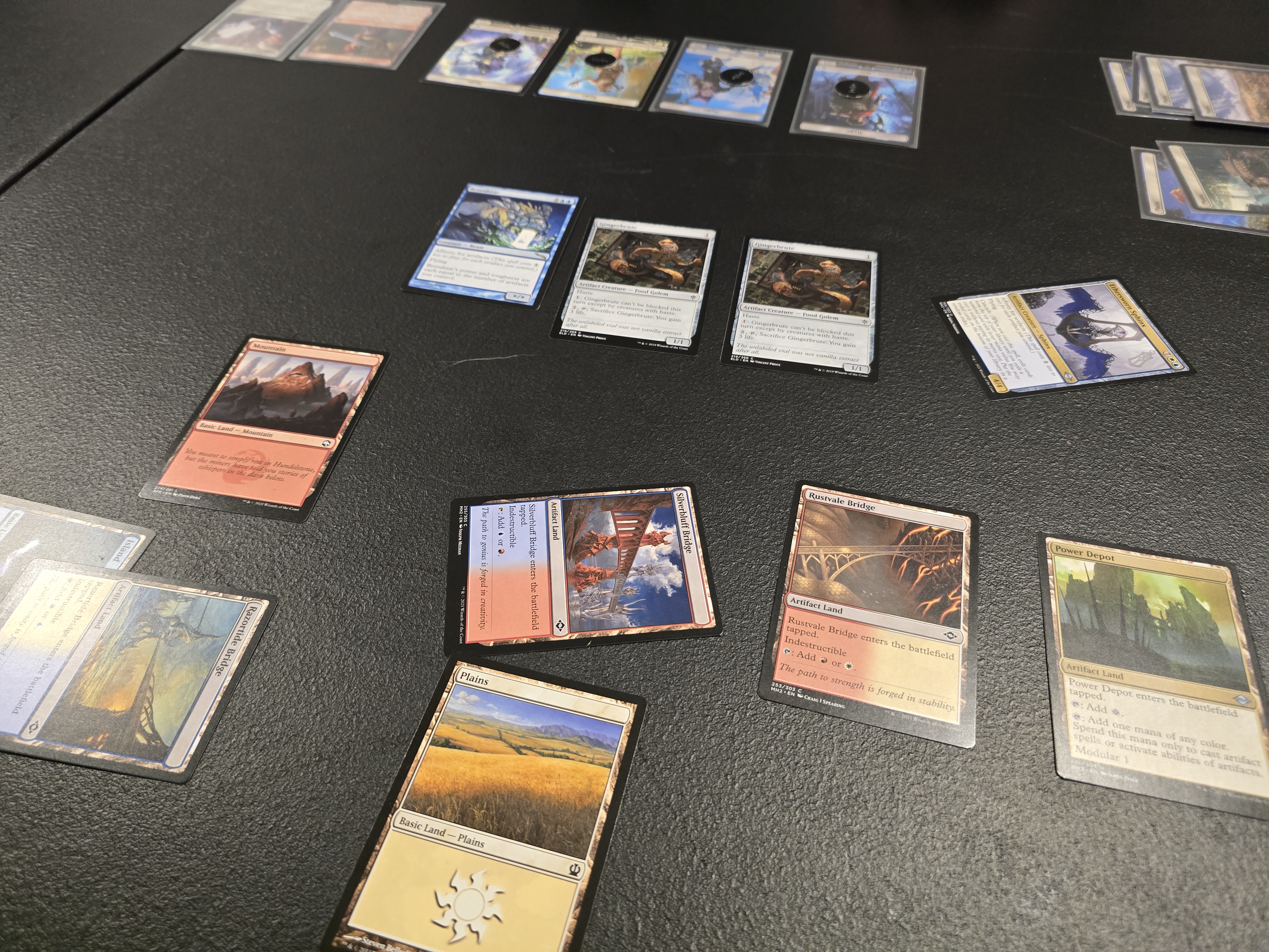 Magic The Gathering cards displayed on a table