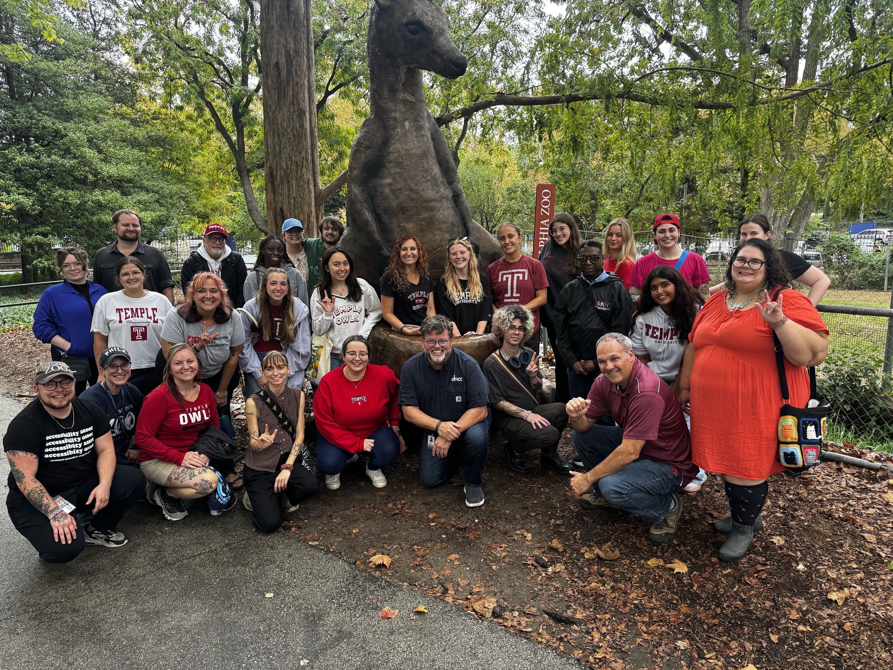 Temple students, faculty, and community partners at the Philadelphia Zoo during d/Deaf Community Day.