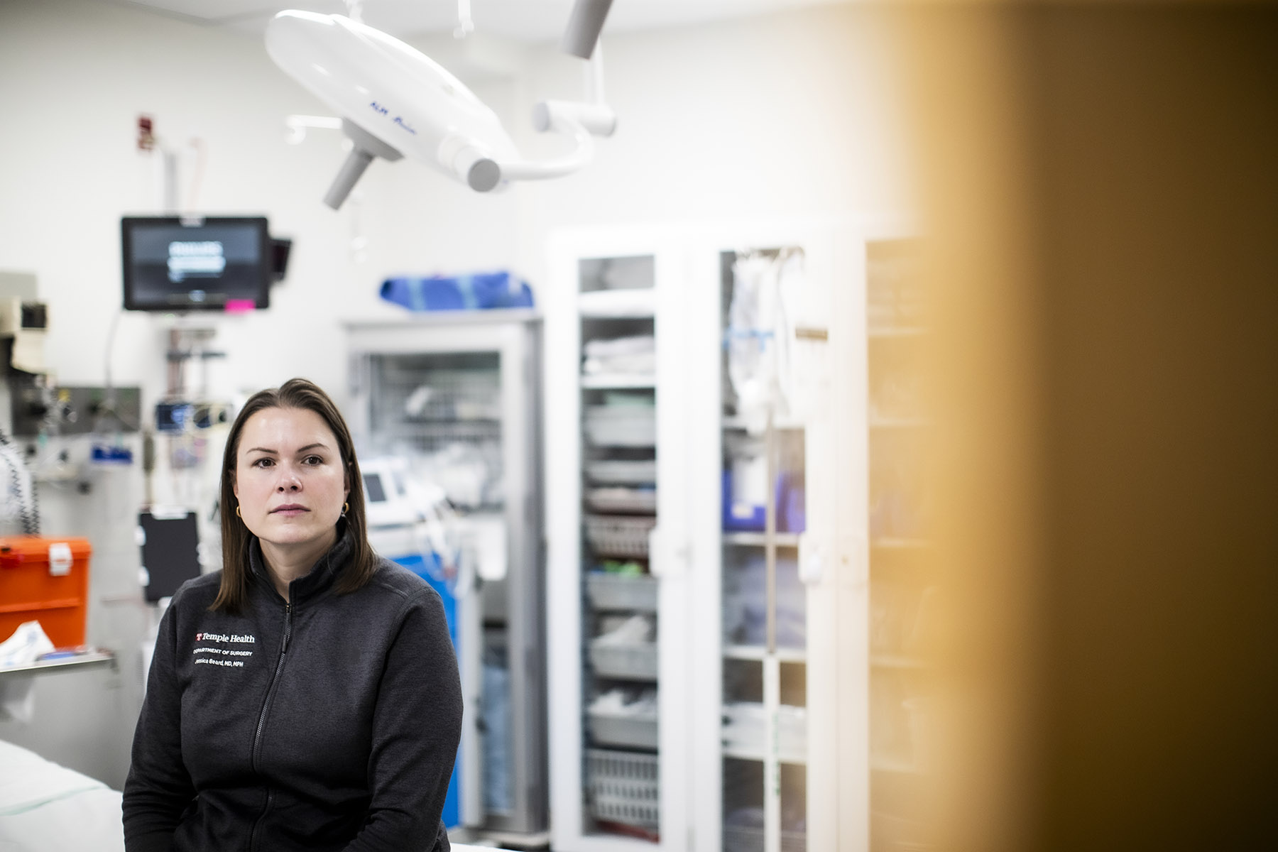 Jessica Beard, associate professor of surgery at the Lewis Katz School of Medicine, studies how news coverage of firearm violence shapes public understanding and harm survivors and communities.