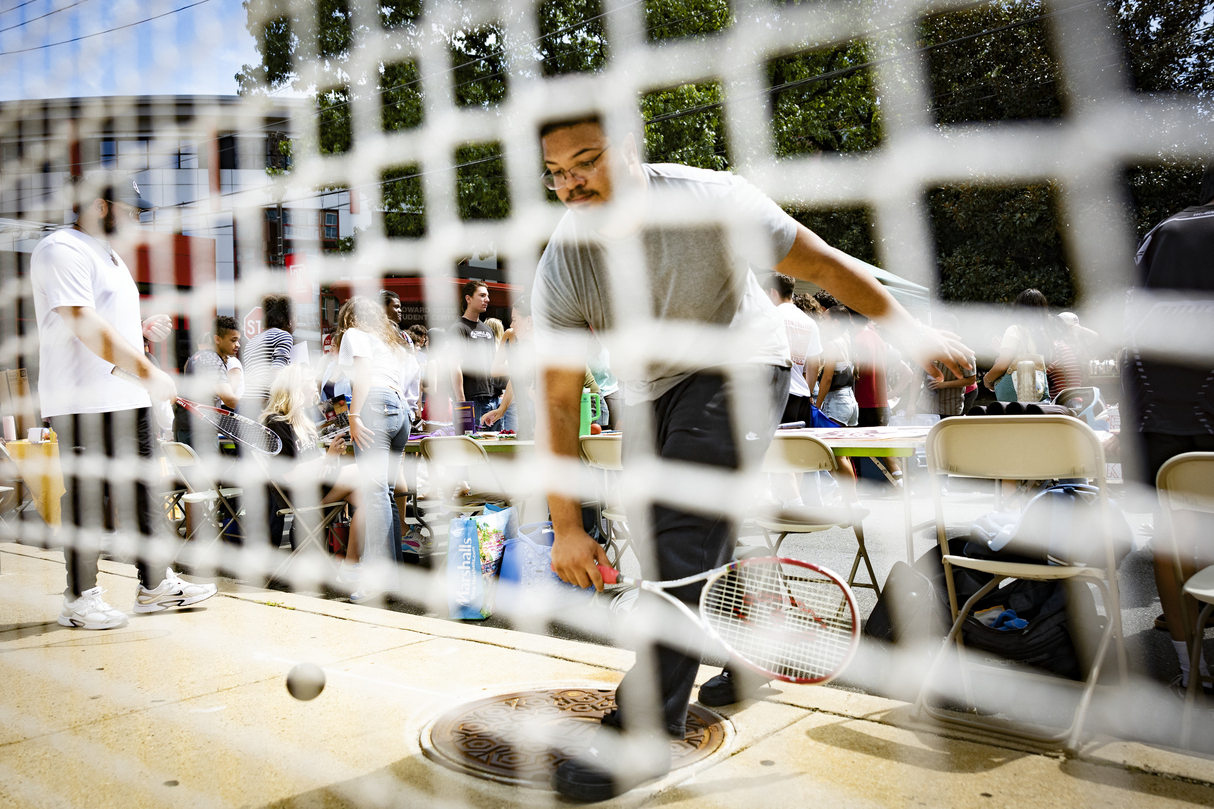 Temple student Quincy McCormick demonstrates squash at Temple Fest.