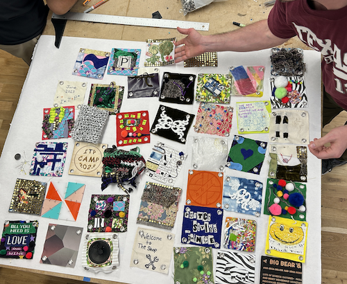 Quilt squares on a table.