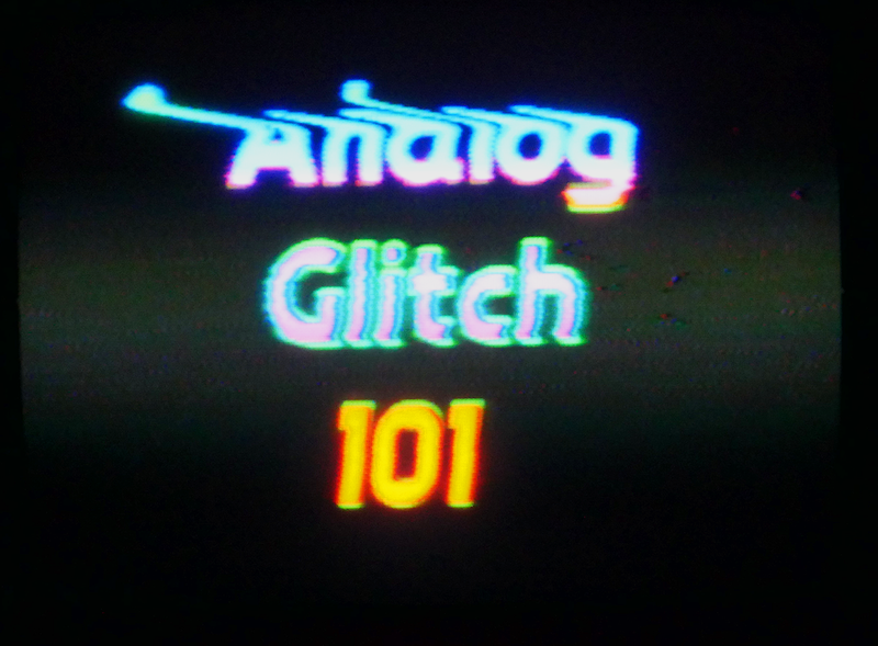Video screen with text reading Analog Glitch 101.