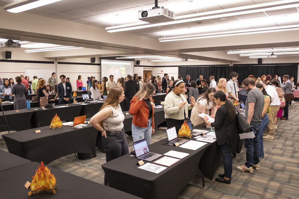 Students present their portfolios to employers during the 2023 Senior Showcase