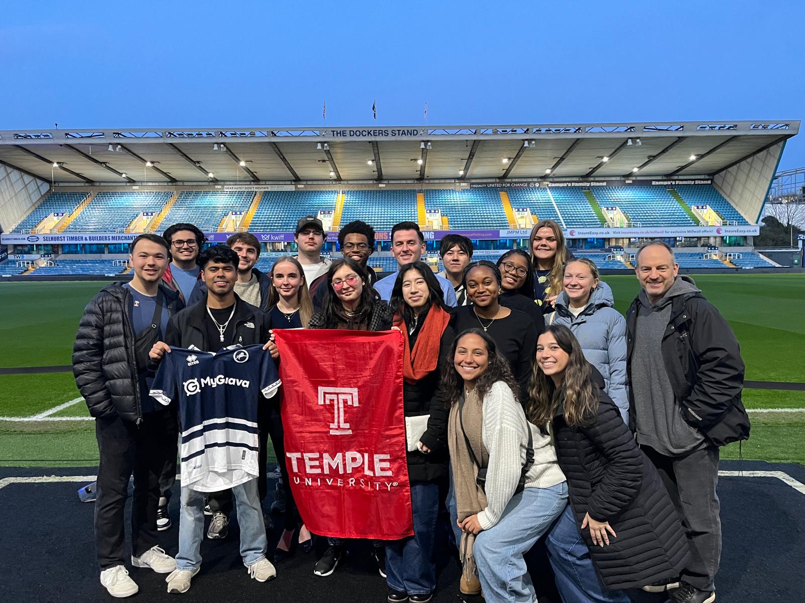 Students with Temple flag