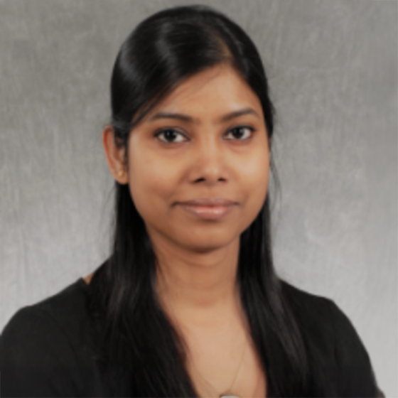 image of Afrin wearing a black top smiling at the camera