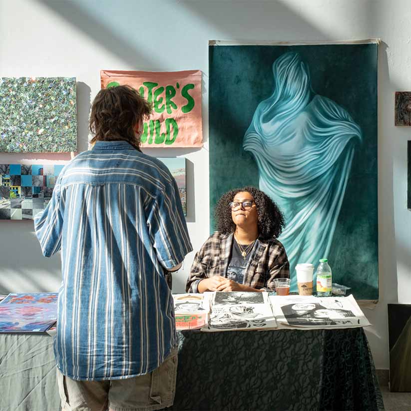 students interacting at a school club assembly