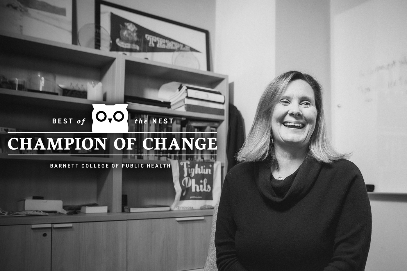 Jessica Boyer laughing in her office.