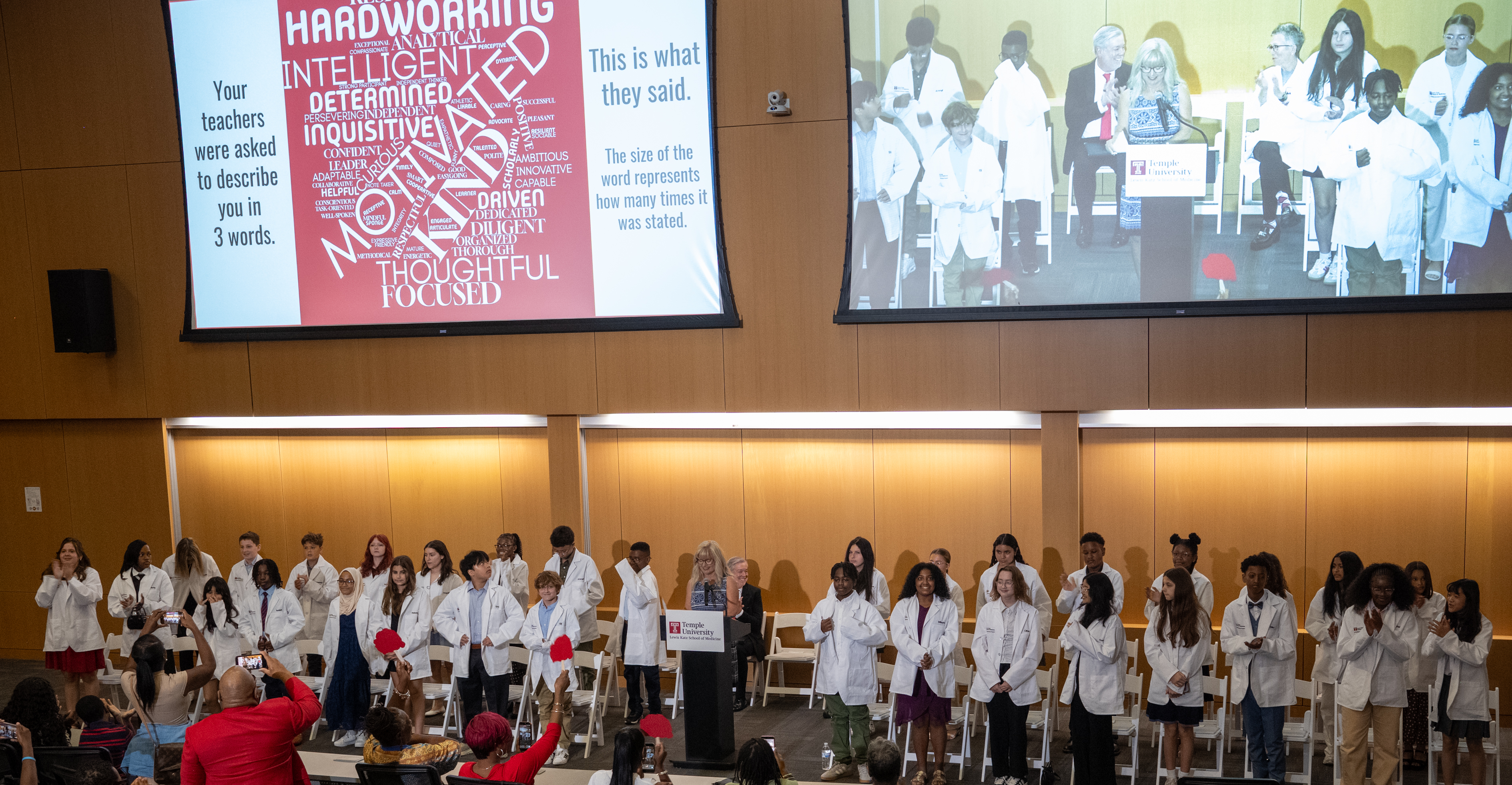 Philadelphia seventh graders receive their white coats at Temple University's Lang Medical Scholars White Coat Ceremony.
