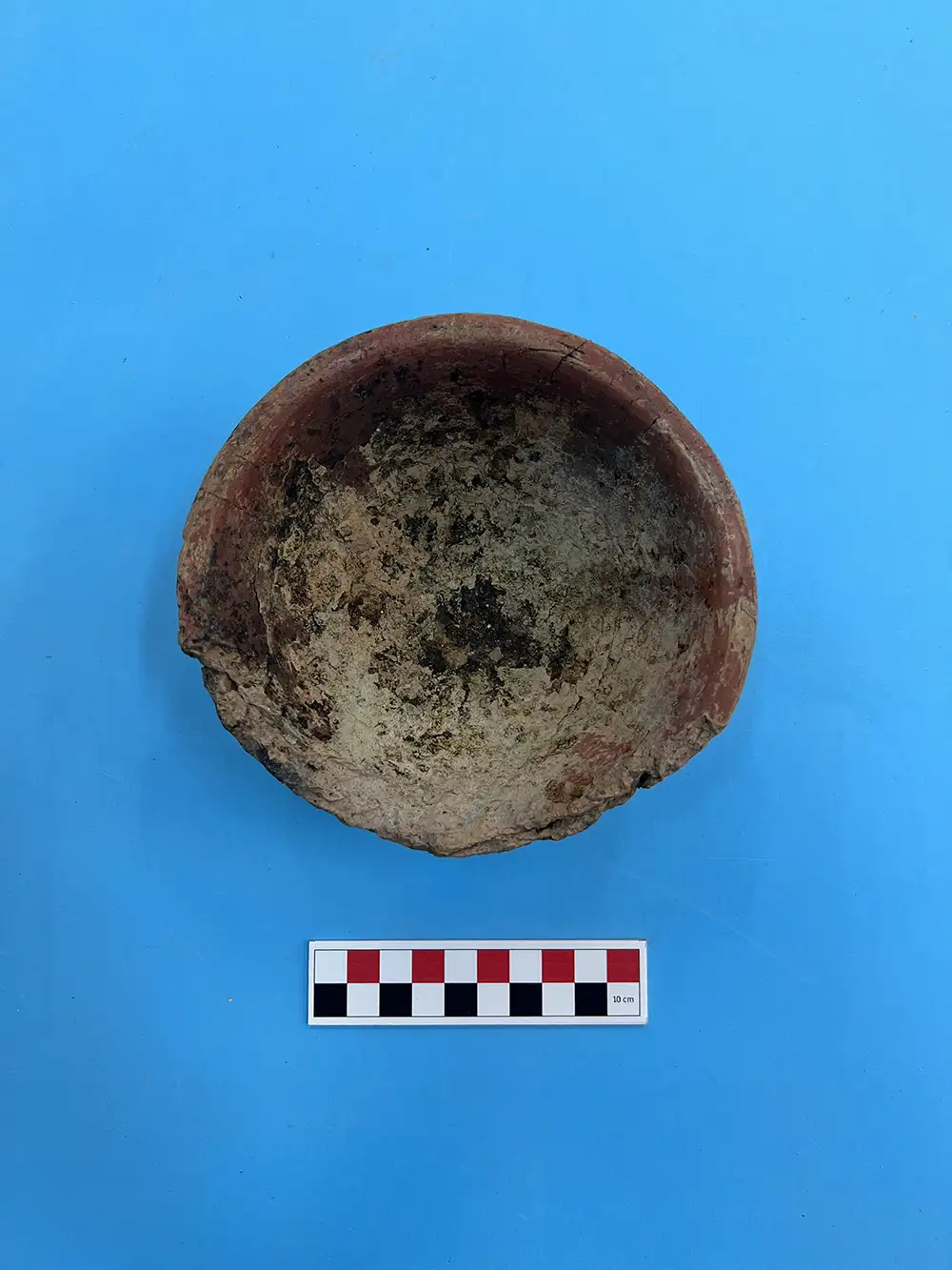 Melting pot dating to the third millennium BCE with metal slag preserved inside, found at Karayavşan Höyük, central Türkiye