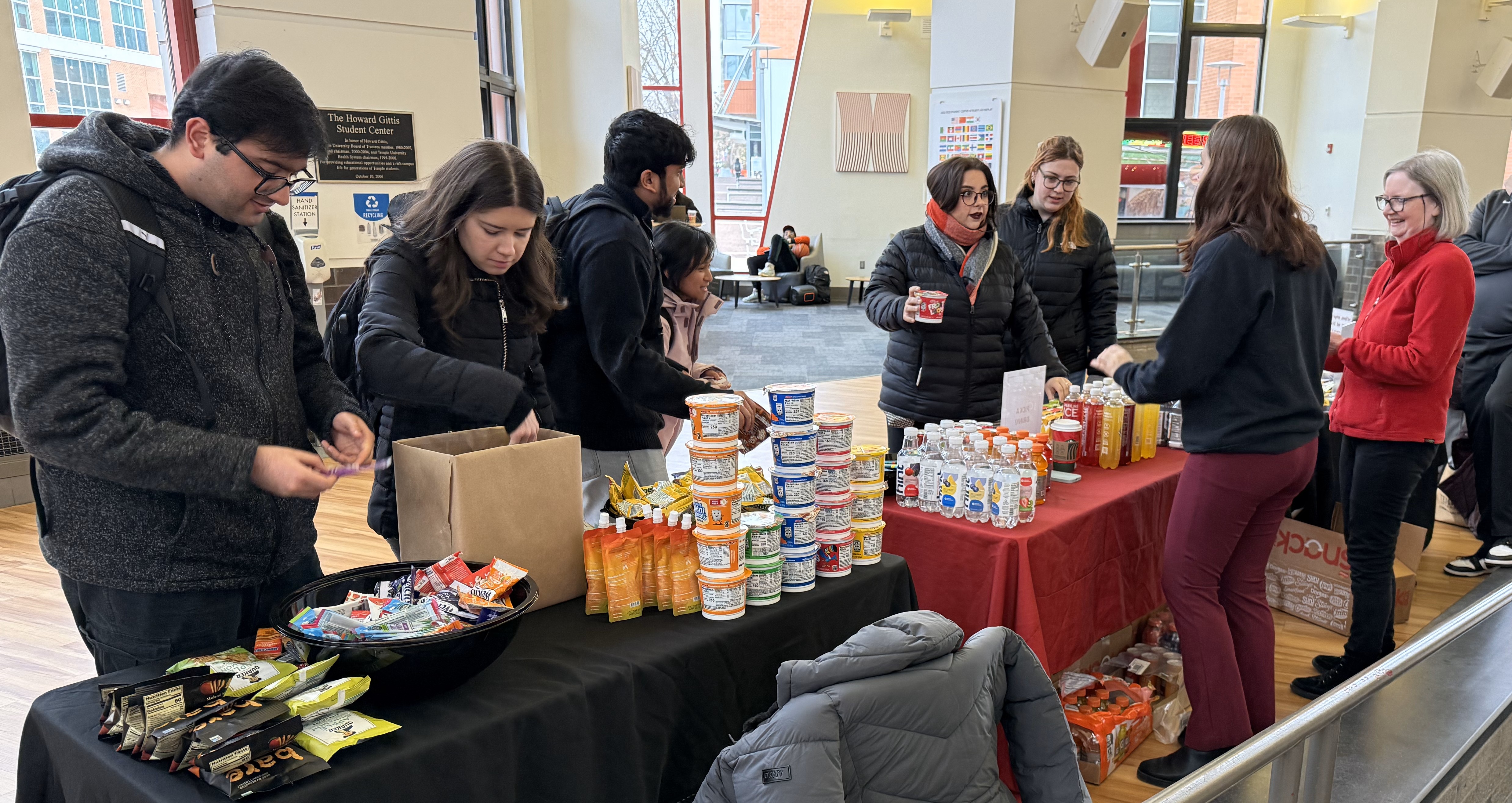 Students grab snacks during final exam week as part of the new High-fives for Finals event.