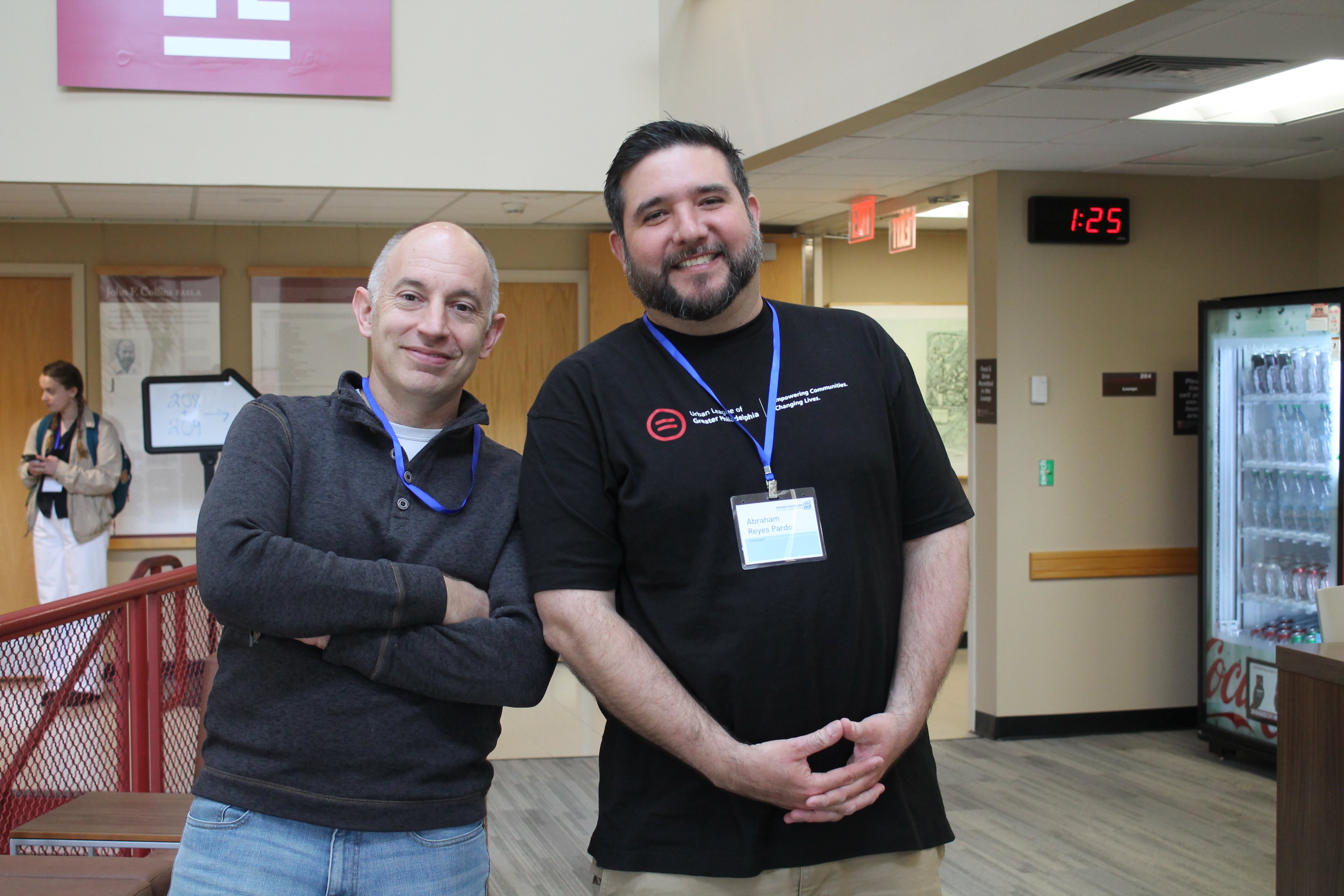 Kenneth Bigos and Abraham Reyes Pardo standing side by side at Ambler Campus during the retreat.