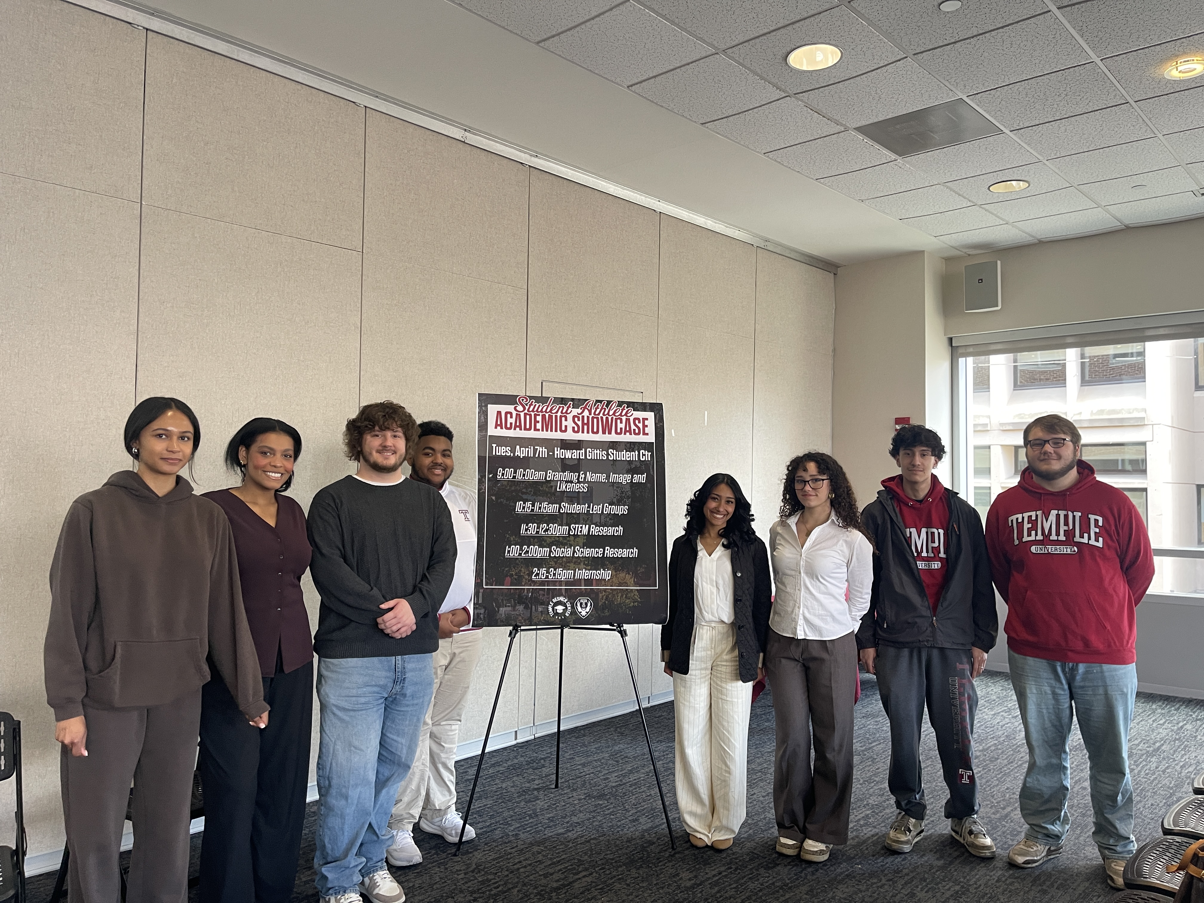 Students standing around a poster