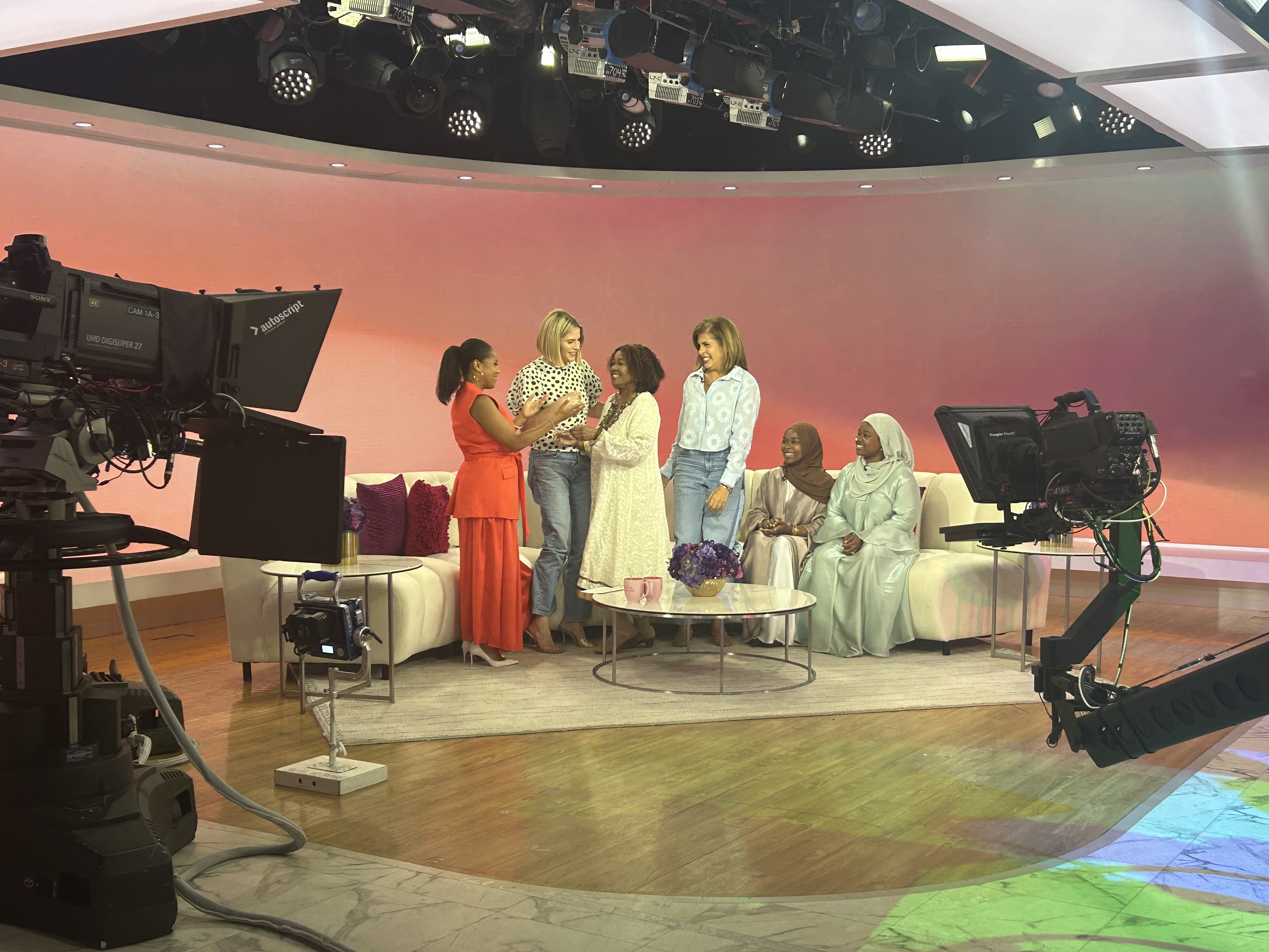 Temple employee Peggy E. Moore is welcomed onto the Today show set.