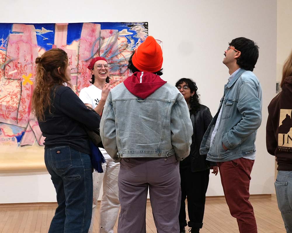 students gathered at the Spring 2026 MFA opening reception