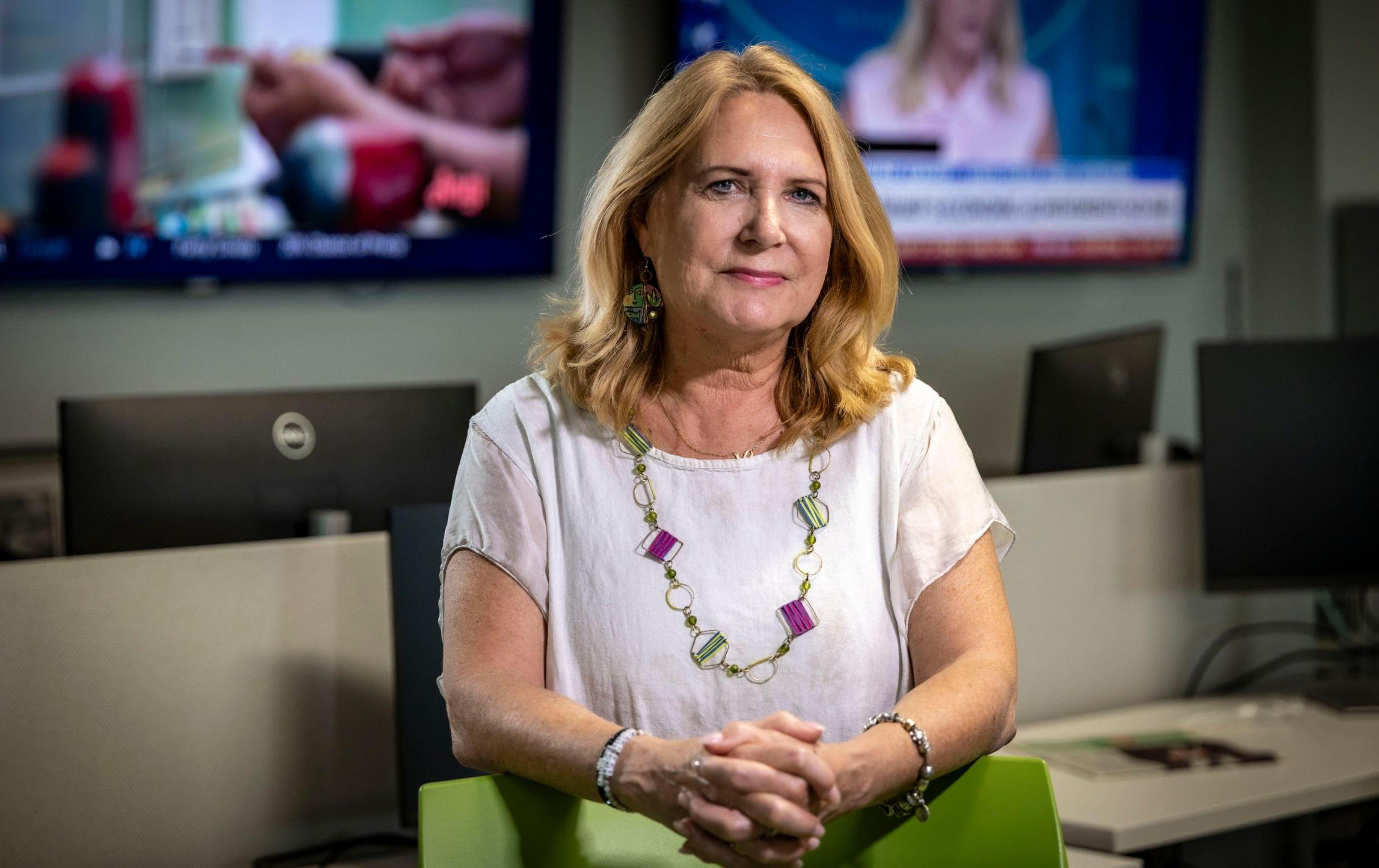 Julie Brown seen in the Miami Herald newsroom.