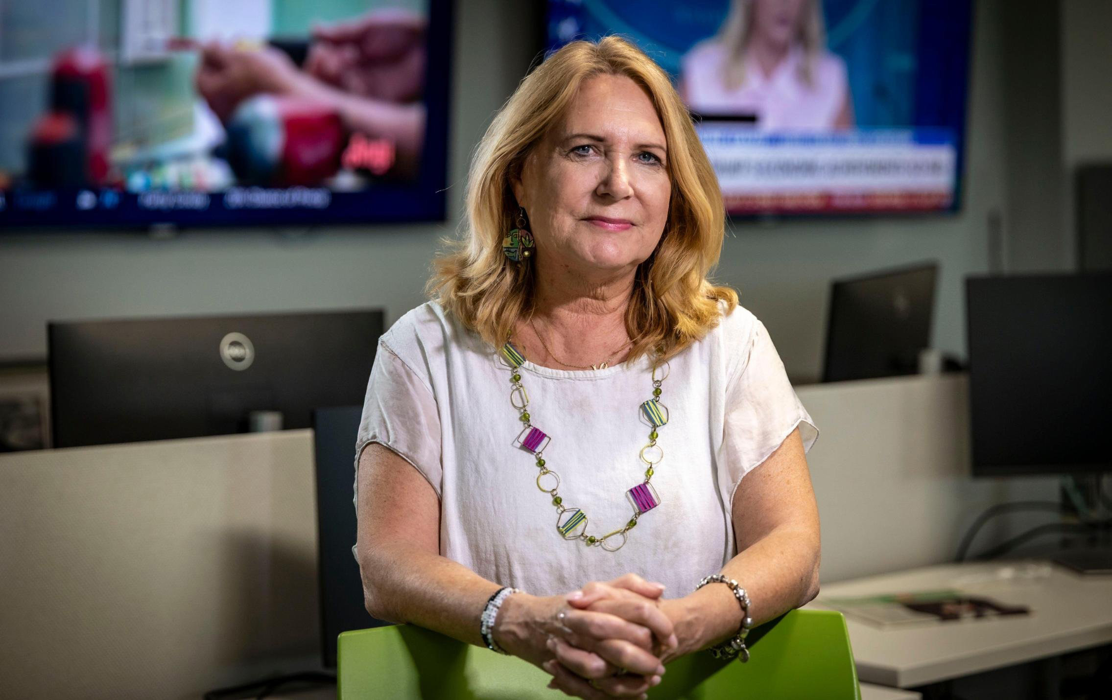 Julie Brown seen in the Miami Herald newsroom.