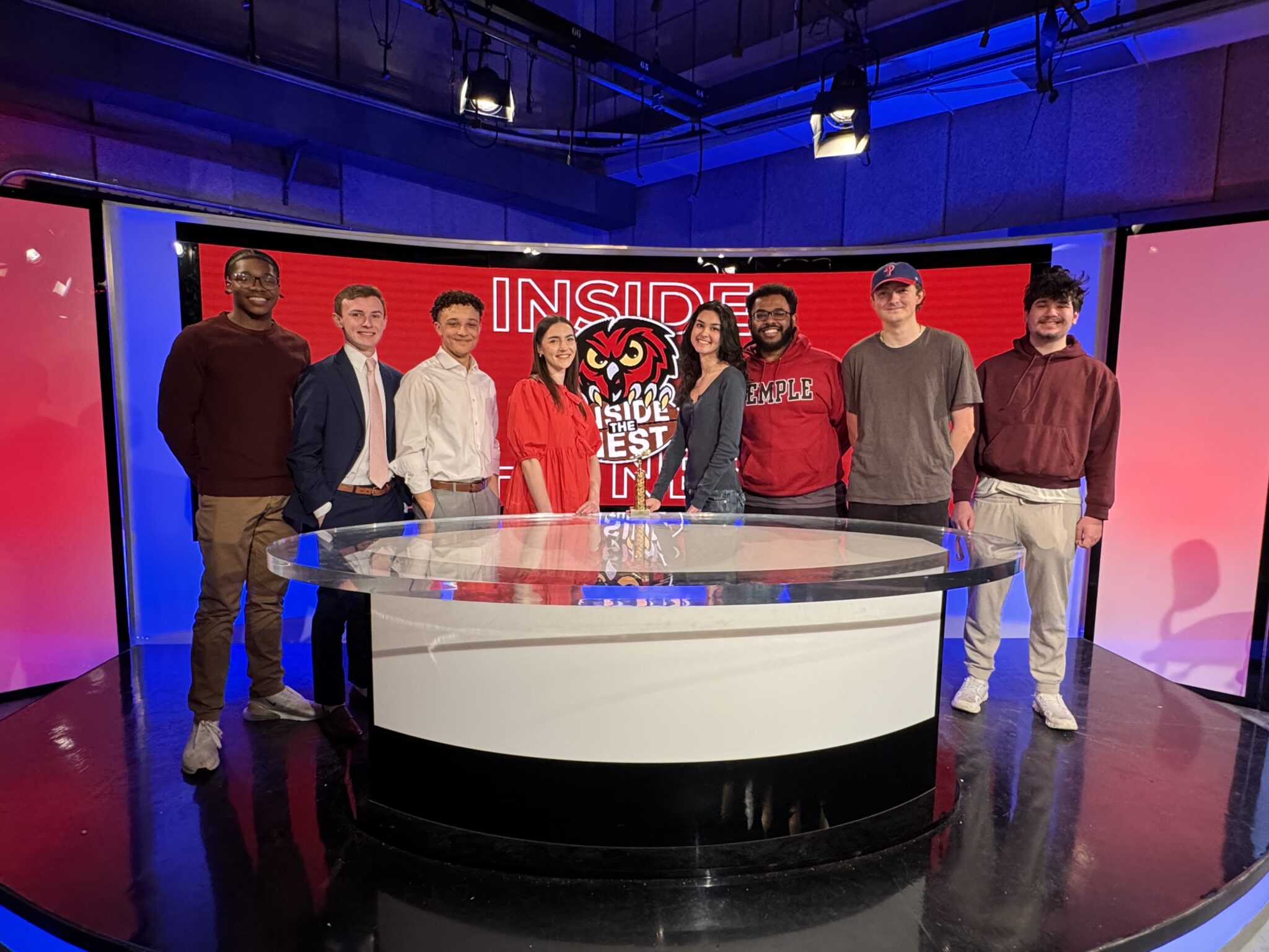 students at news desk