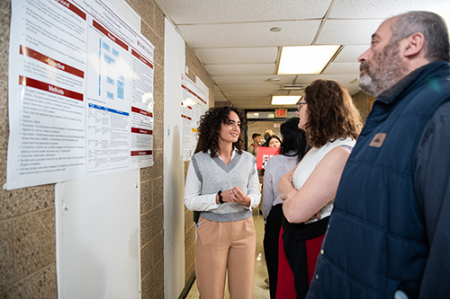 Students presenting a poster
