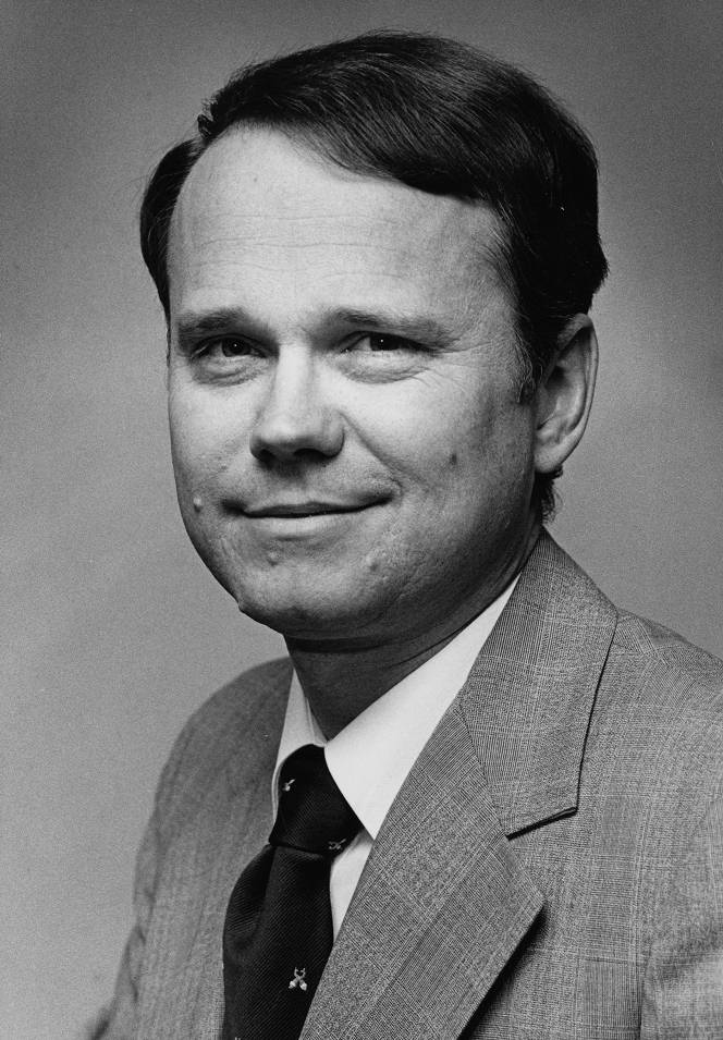 Photo of Dr. Ridenour looking onward