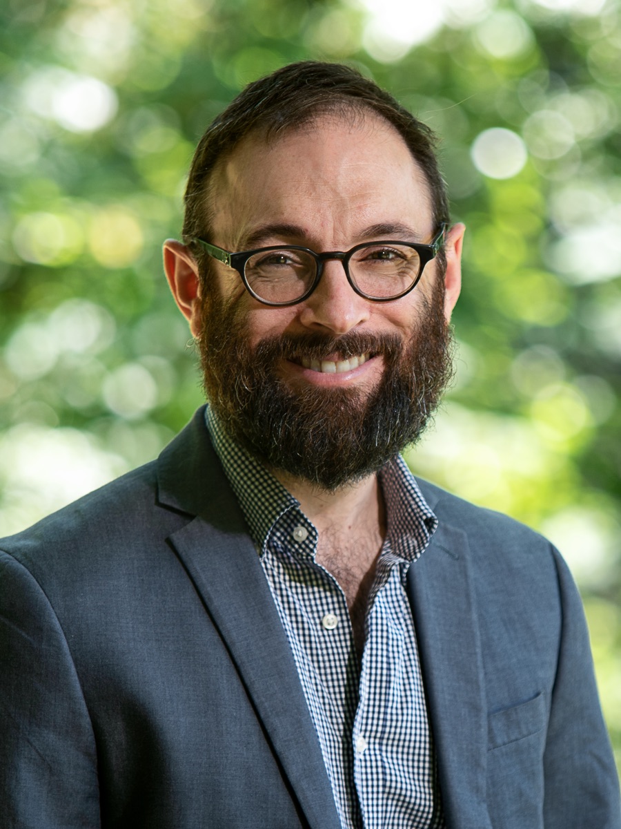 Sam Lebovic smiling at the camera