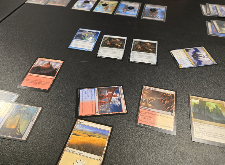 A tabletop showing cards from Magic The Gathering