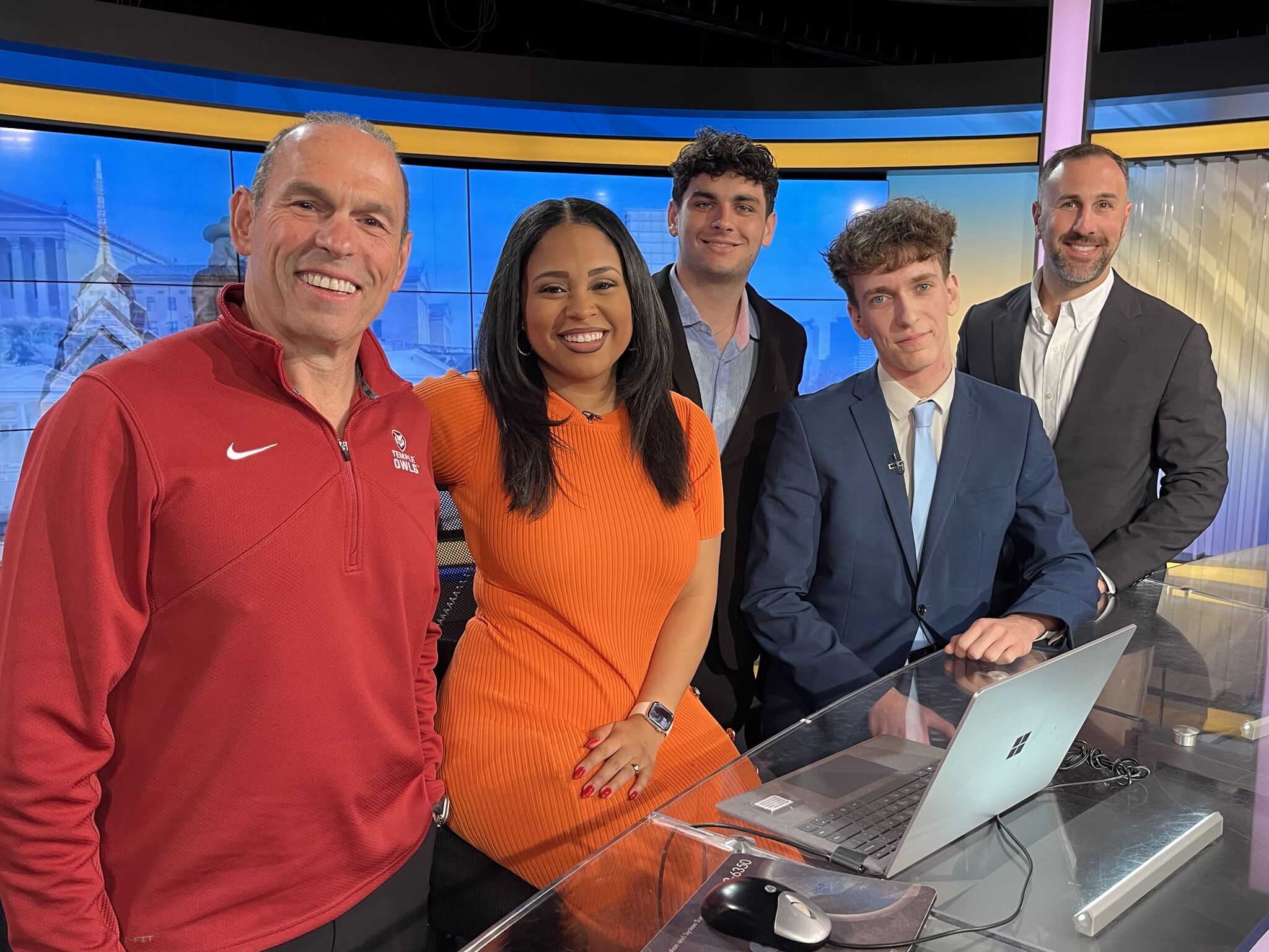 Individuals from Temple and FOX 29 on set