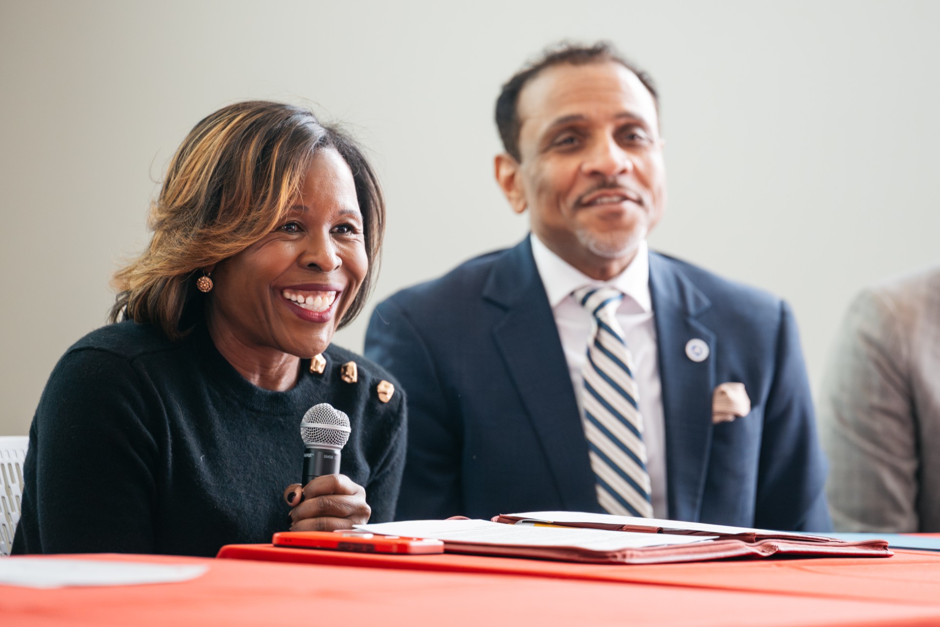 Monika Williams Shealey sits at a table.