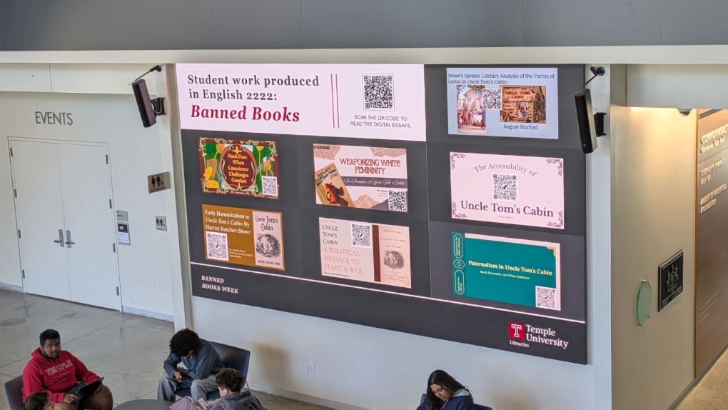 Charles Library displays student projects on first floor screen.