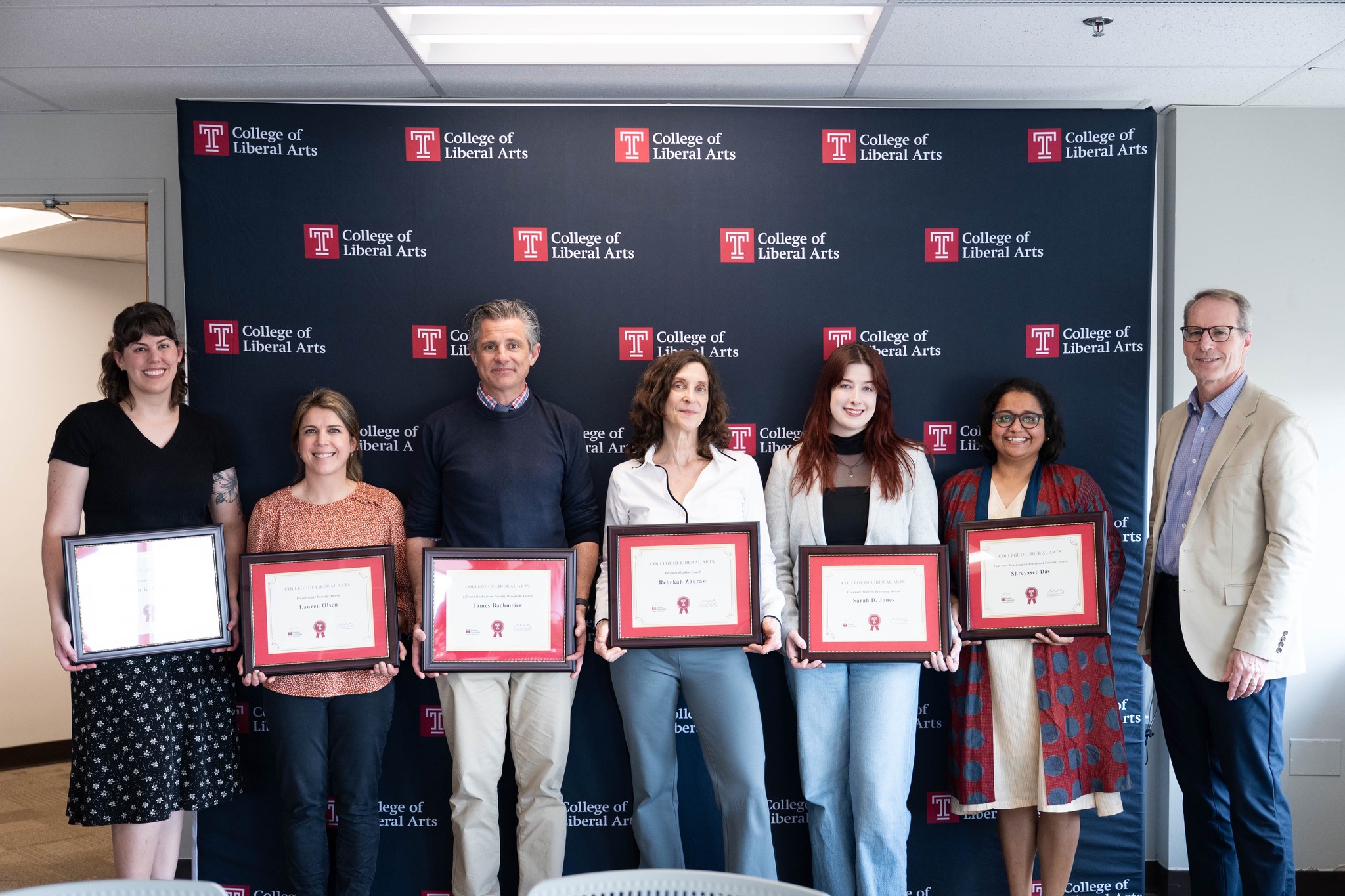 Winners of CLA faculty awards pose with Dean Deeg.