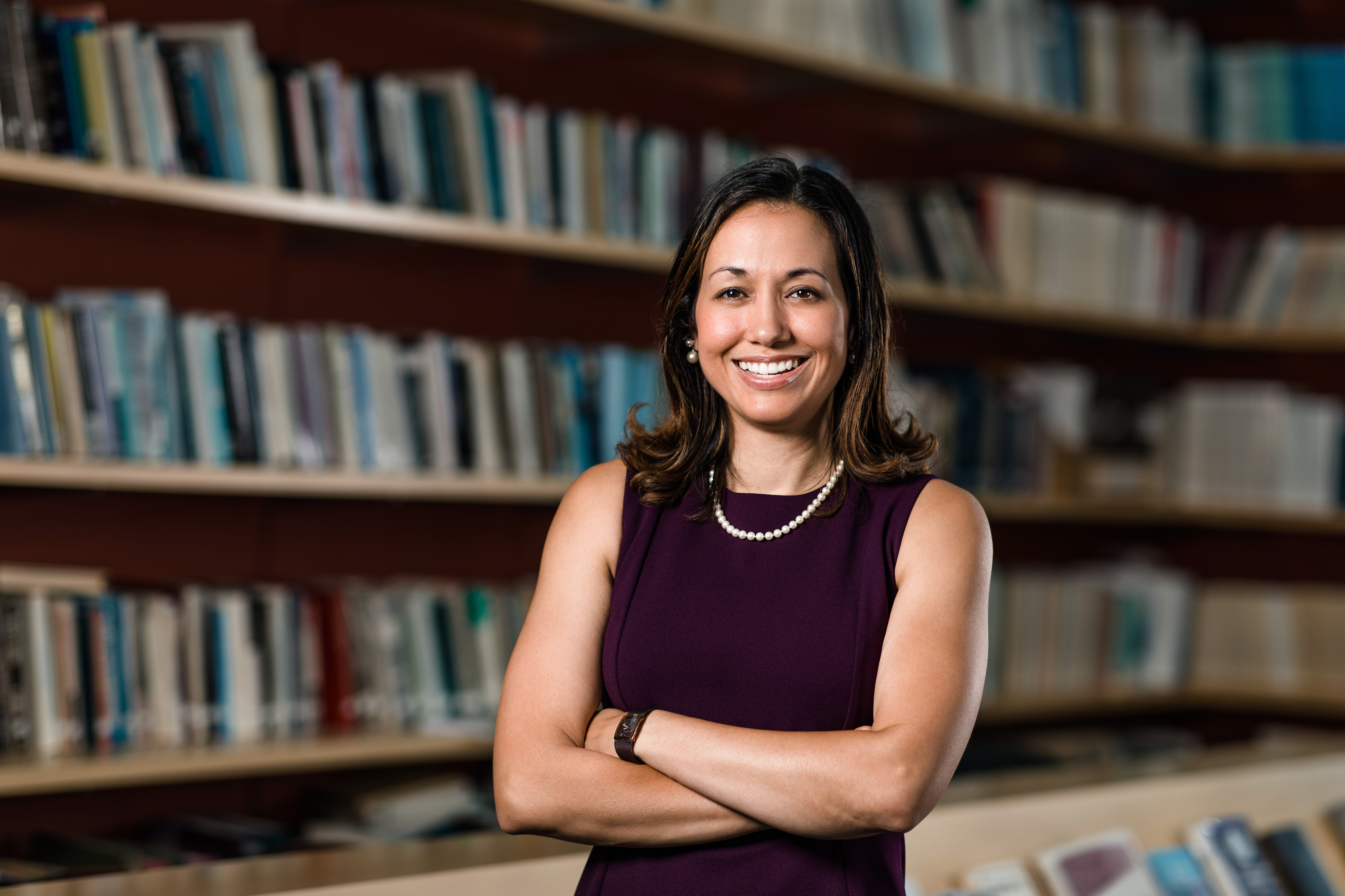 Aileen Teague with arms crossed looking at the camera