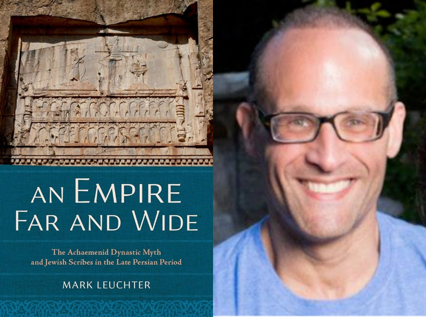 Mark Leuchter beside the cover to his book