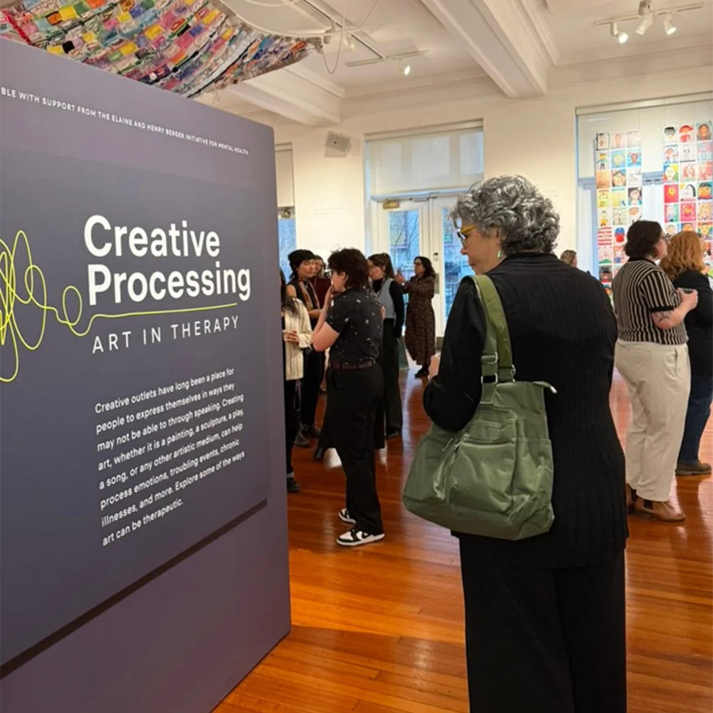 people attending the Creative Processing exhibition