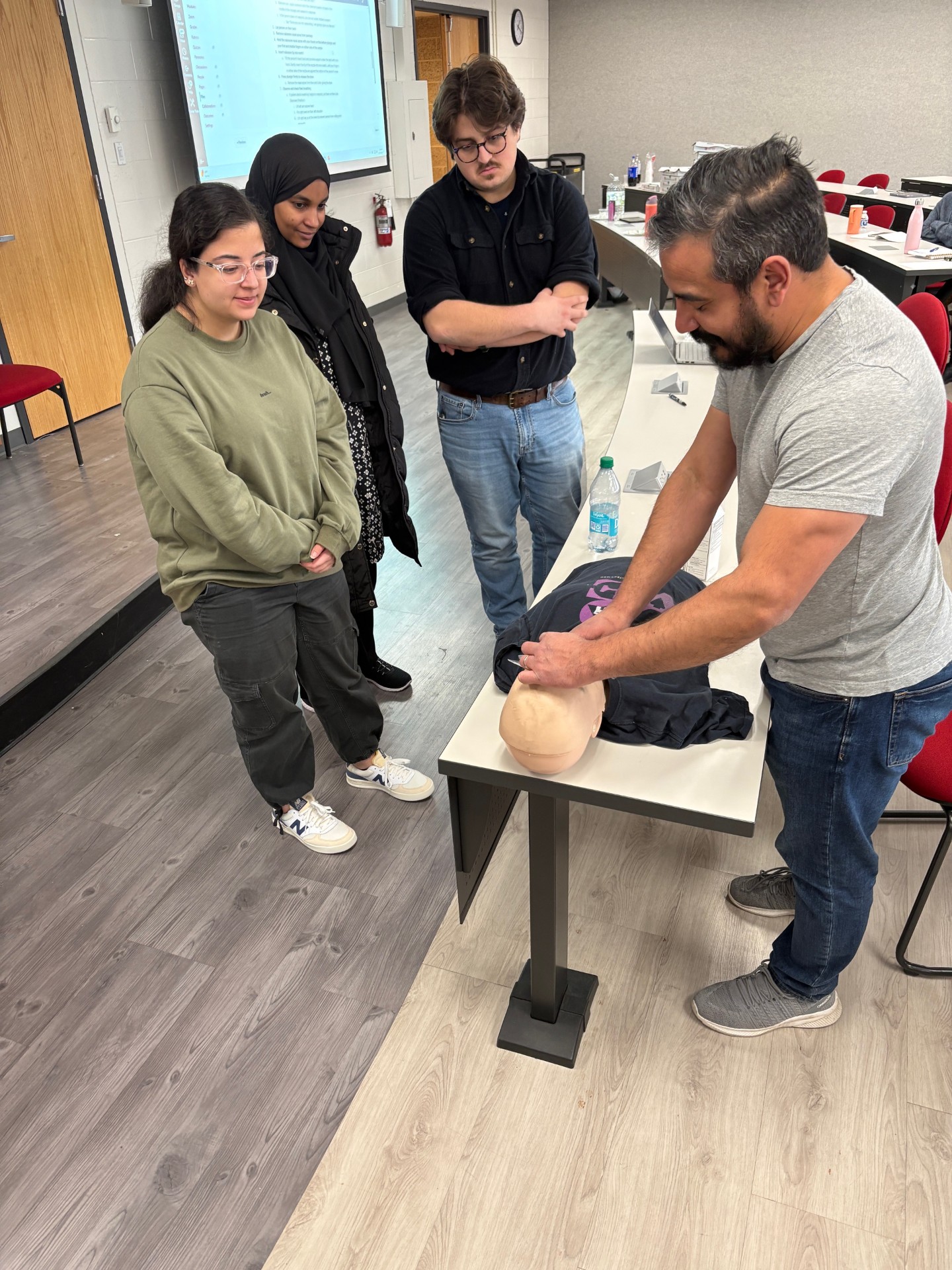 Instructor providing training to students