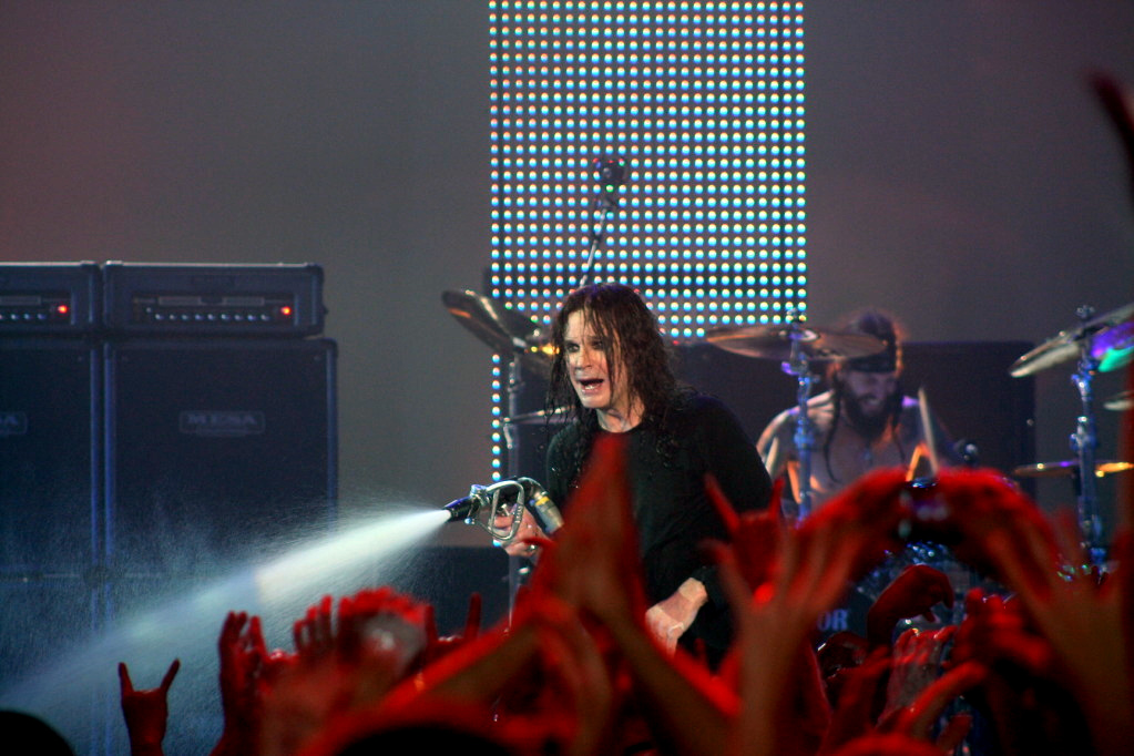 Ozzy Osbourne spraying crowd with a hose