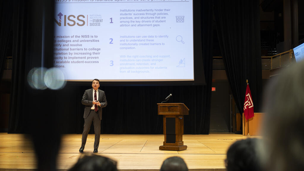 Tim Renick pictured presenting NISS findings.