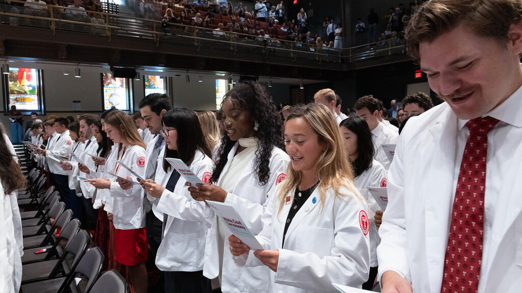Students reading the oath